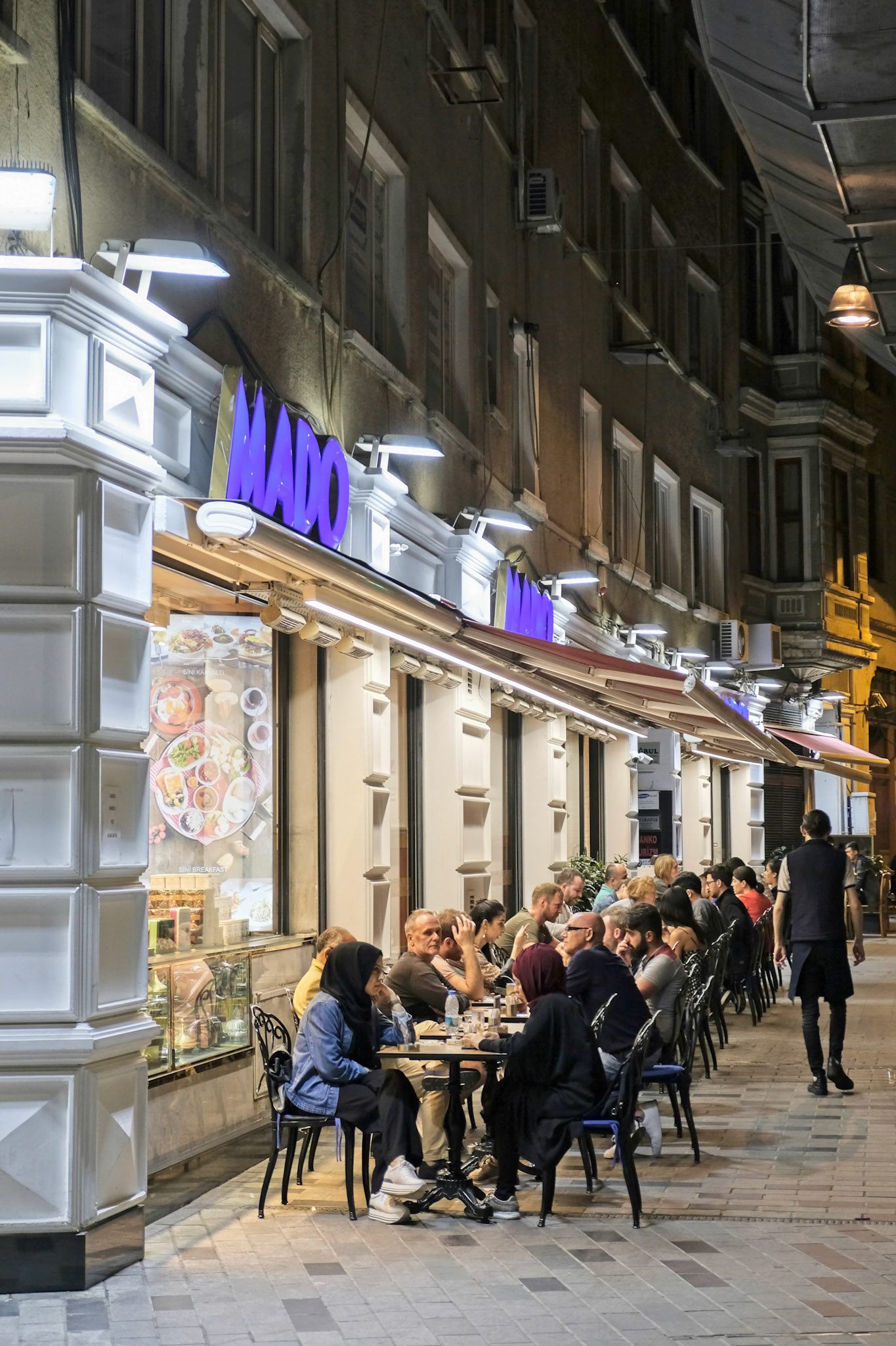 ISTANBUL, TURKEY - MAY 24 : People out and about at night in Istanbul Turkey on May 24, 2018. Unidentified people