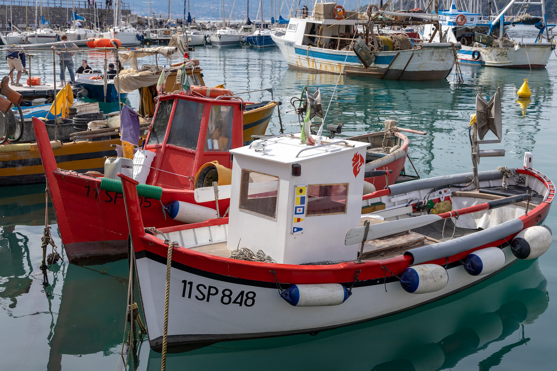 LERICI, LIGURIA/ITALY  - APRIL 21 : Boats in the harbour in Lerici in Liguria Italy on April 21, 2019. Unidentified people
