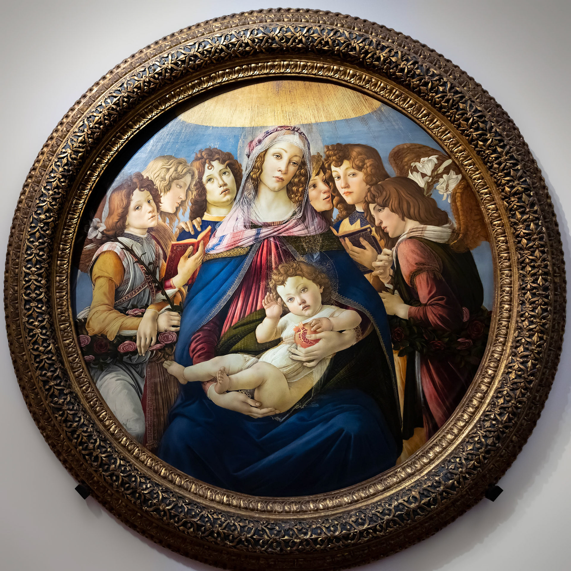 FLORENCE, TUSCANY/ITALY - OCTOBER 19 : Madonna of the Pomegranate painting in the Uffizi gallery in Florence on October 19, 2019