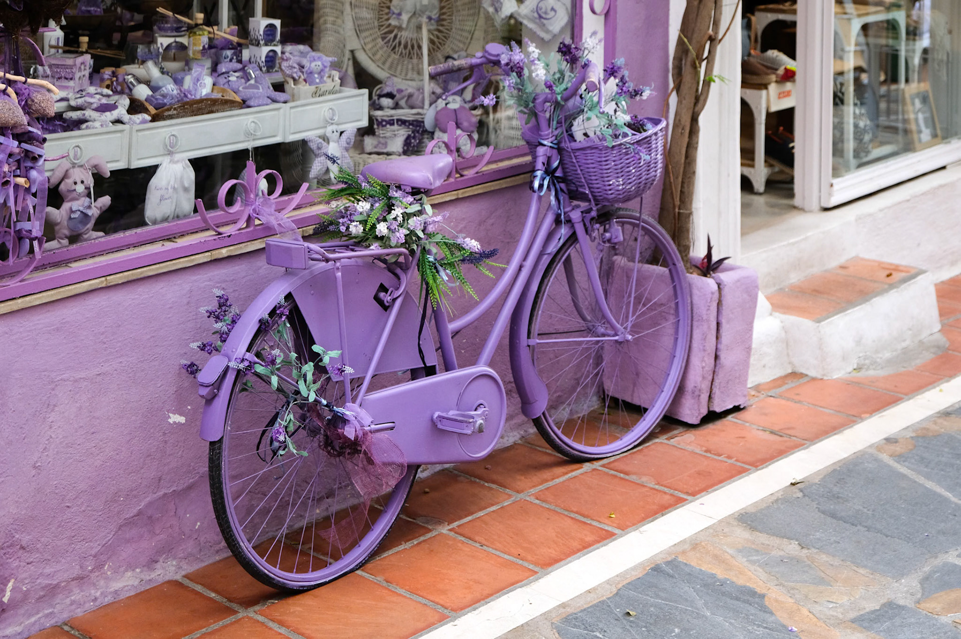 Lavender Bicycle outside a Shop  in Marbella