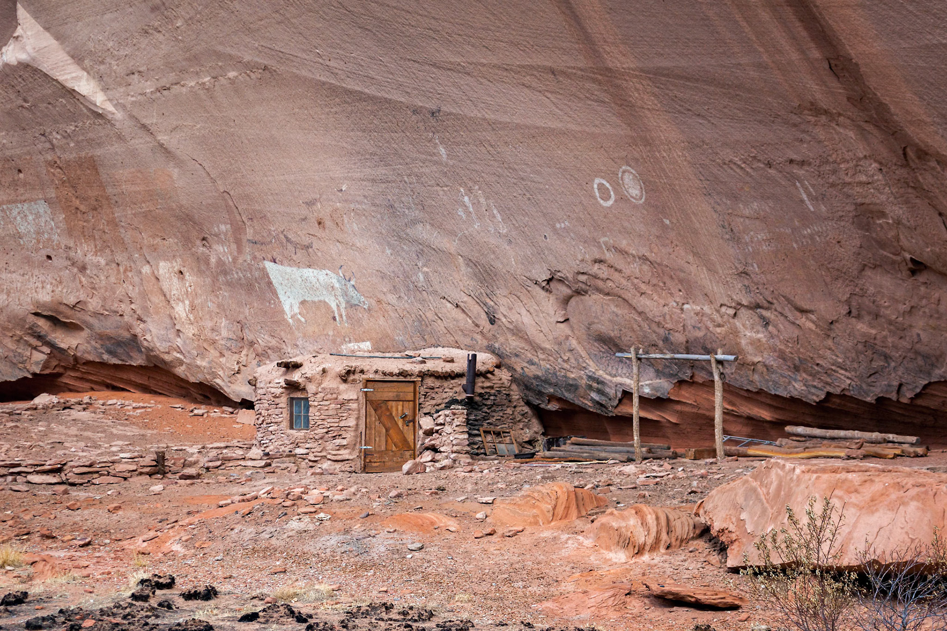 Navajo Indian paintings and dwelling