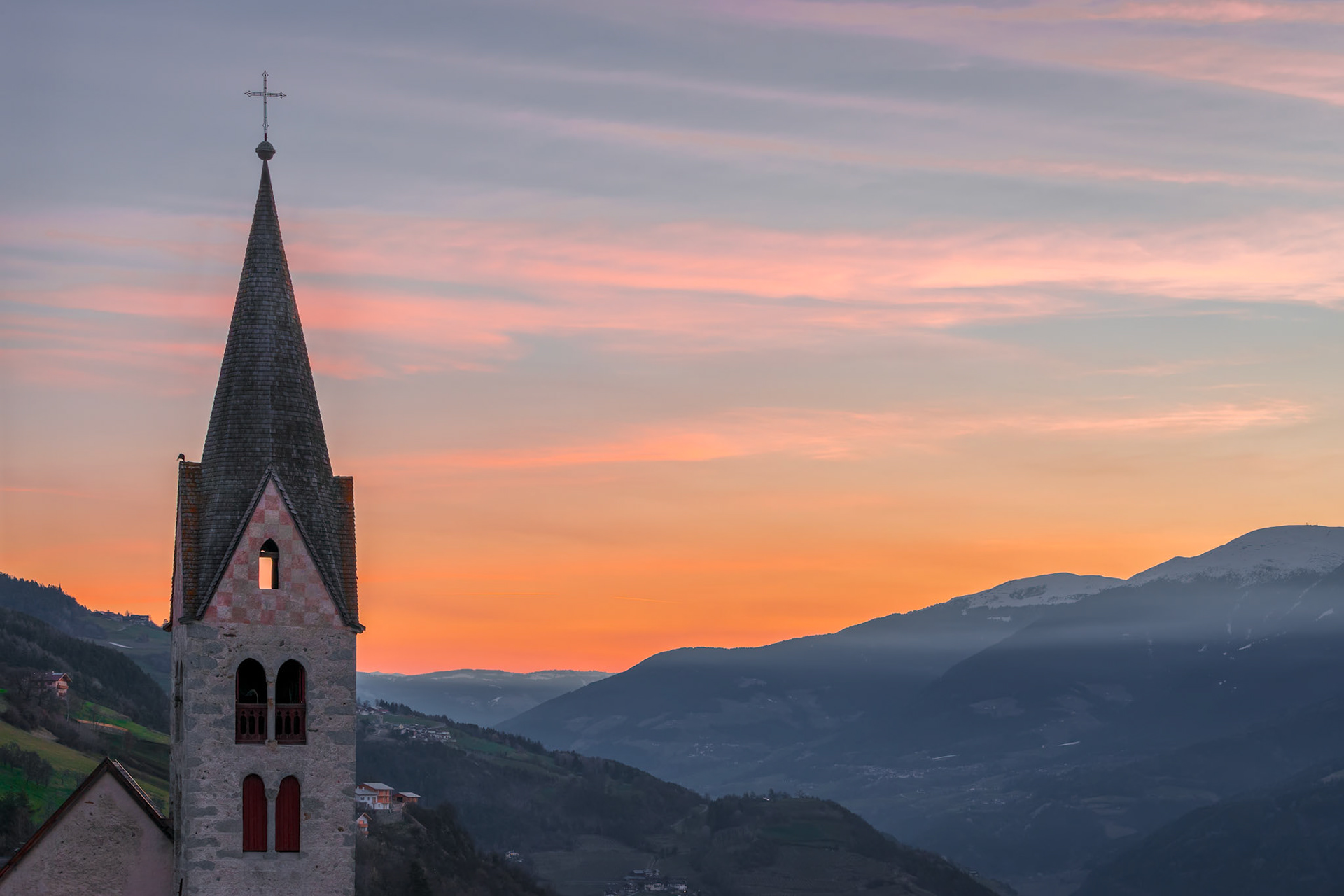 Belfry of the Parish Church in Villanders at Sunrise