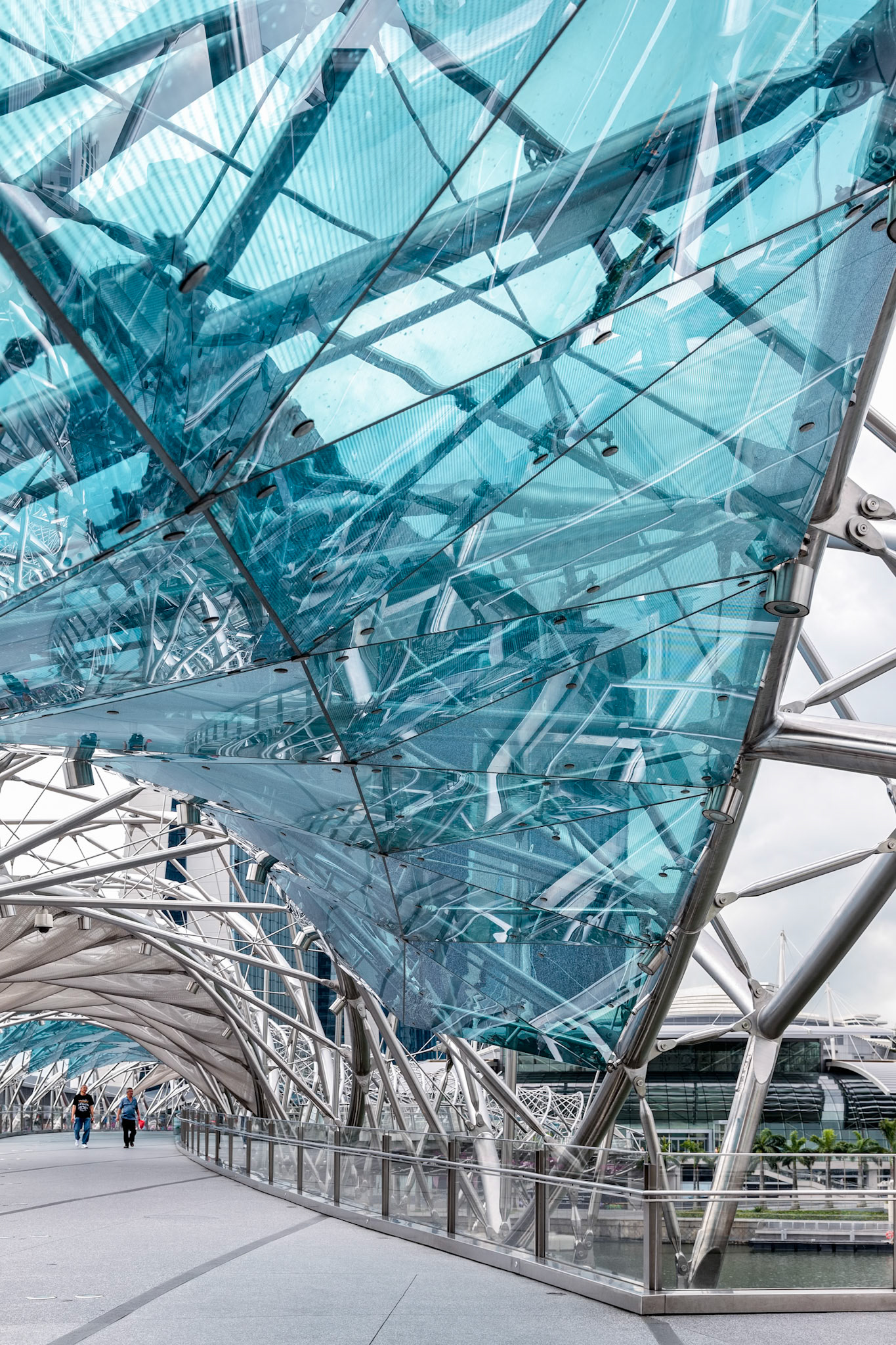 SINGAPORE - FEBRUARY 12 : View of the Helix Bridge in Singapore on February 12, 2012. Two unidentified people