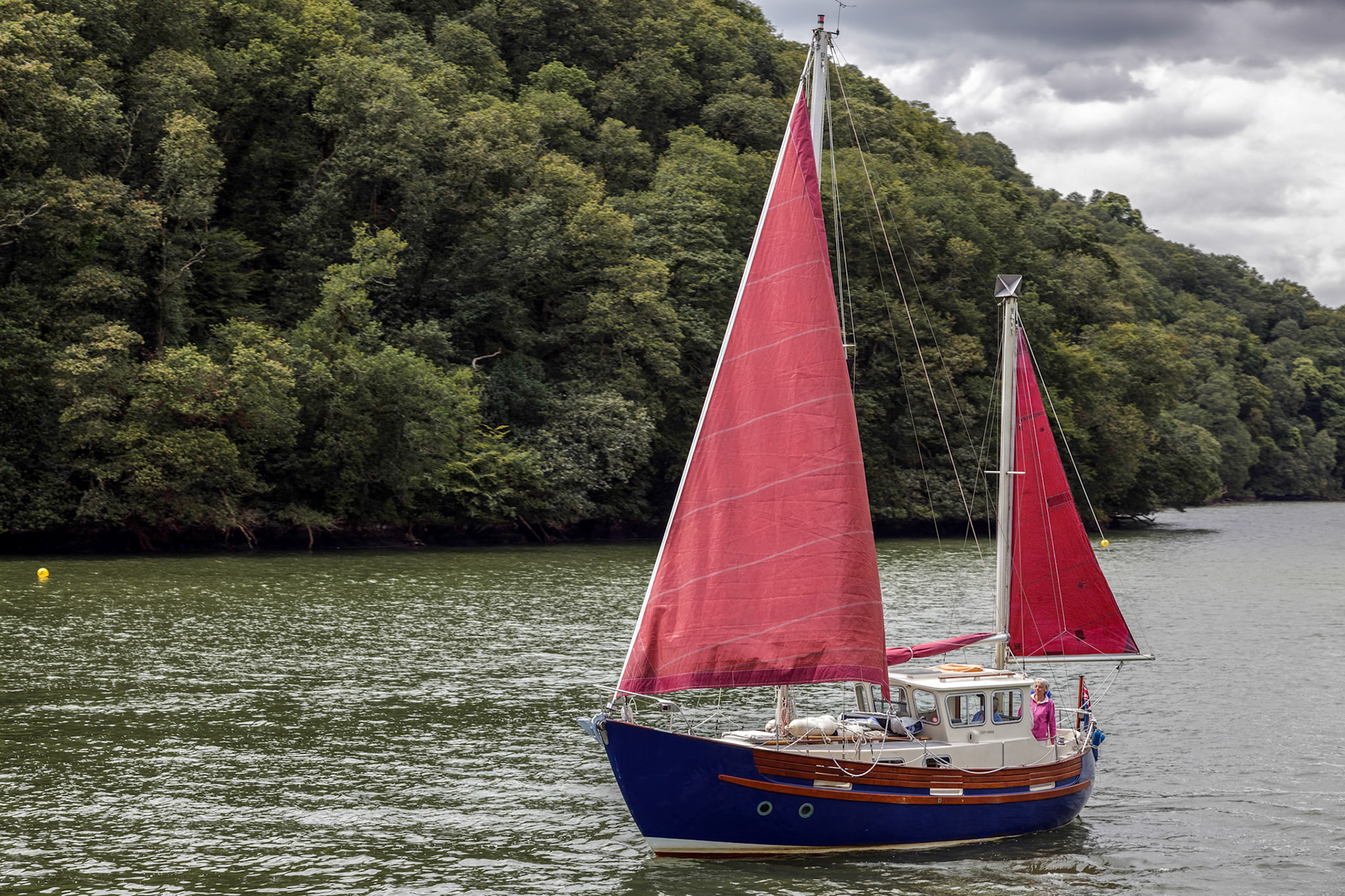 Sailing up the River Dart