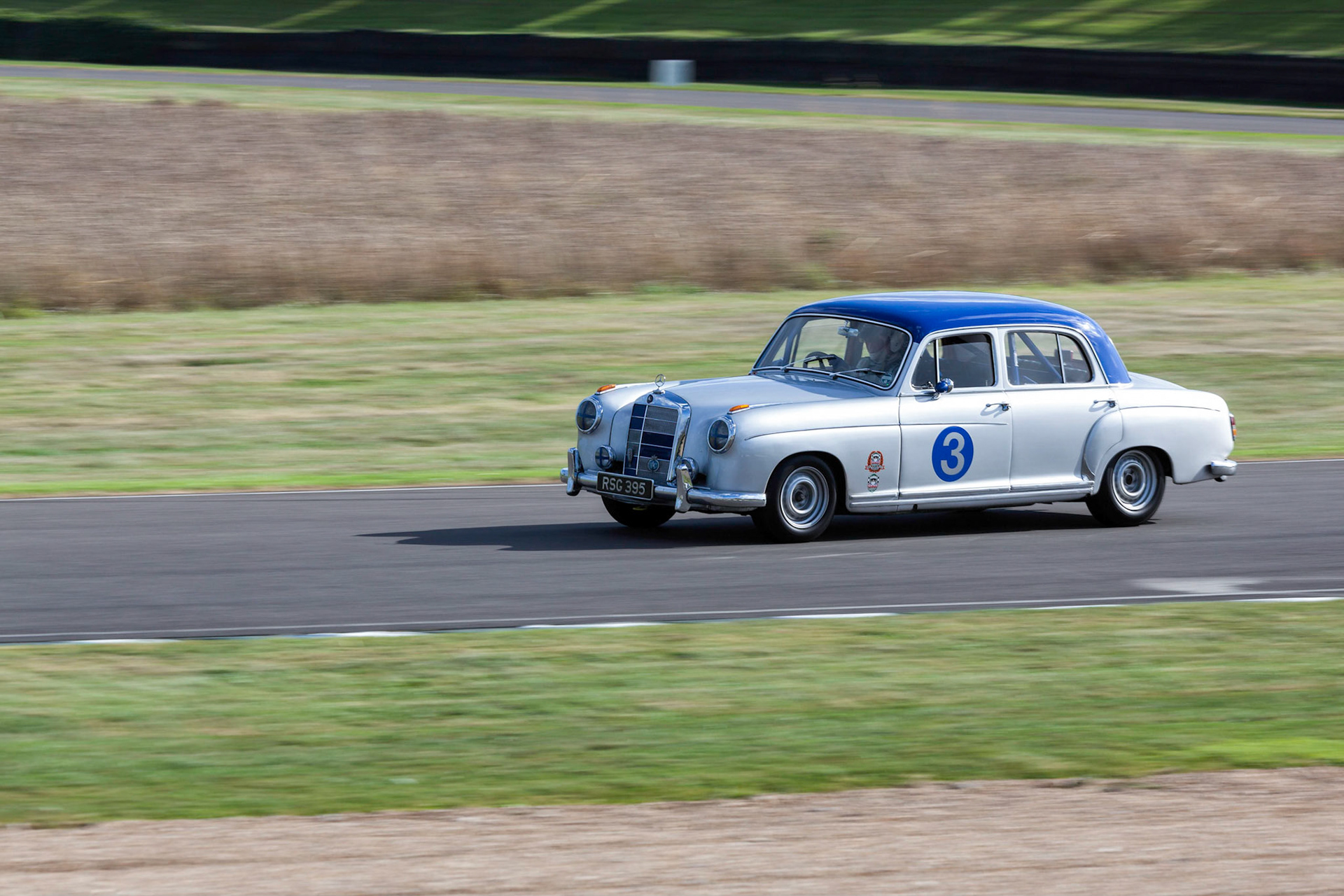GOODWOOD, WEST SUSSEX/UK - SEPTEMBER 14 : Vintage Racing at Goodwood West Sussex on September 14, 2012. One unidentified person