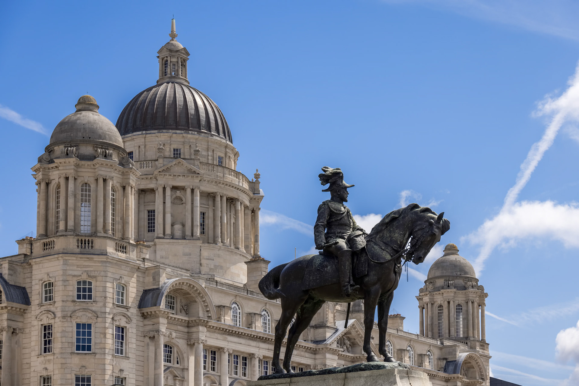 LIVERPOOL, UK - JULY 14 : Statue of Edward VII outside the Royal Liver building in Liverpool, England on July 14, 2021.
