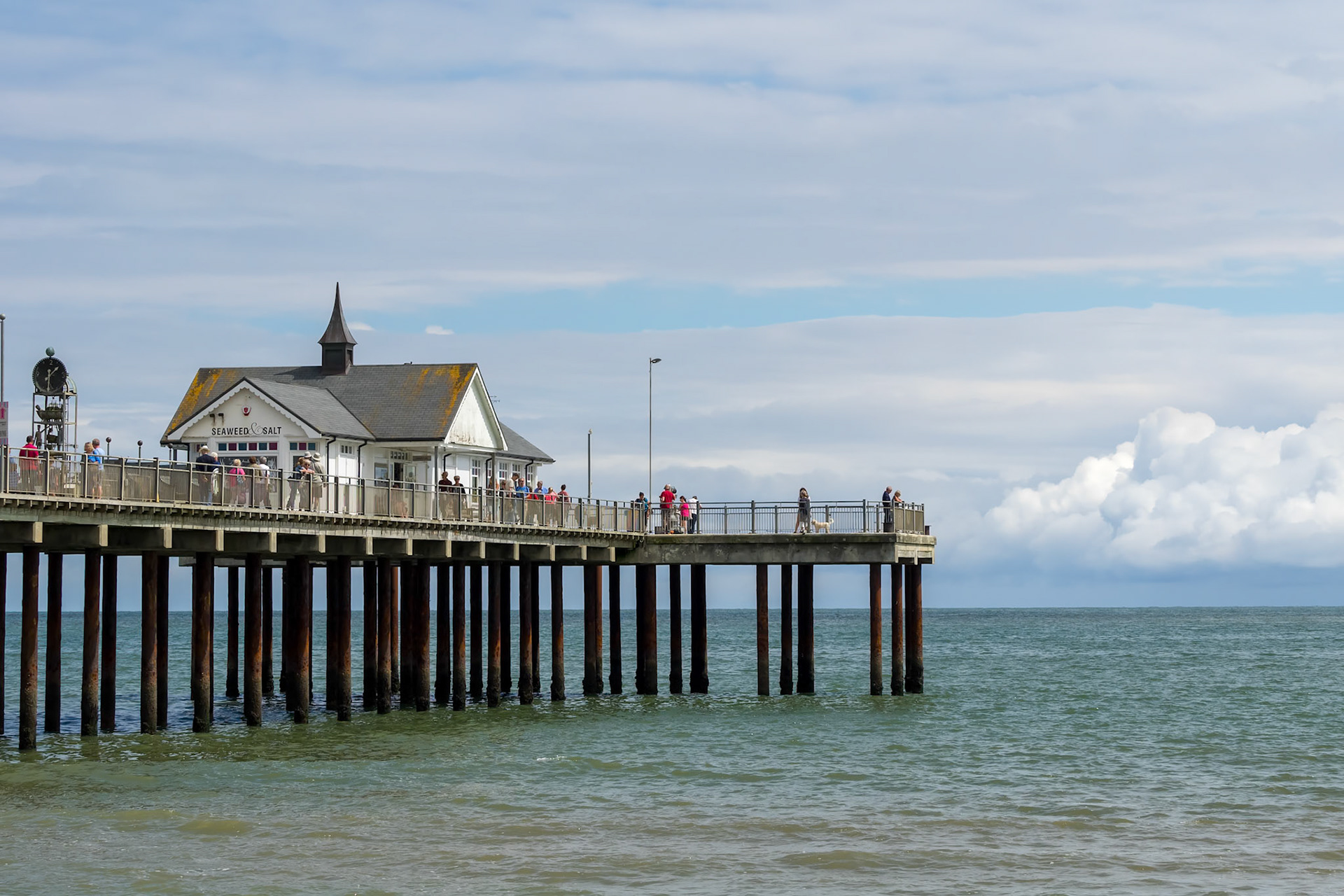 People Enjoying a Sunny Day Out on Southwold Pier