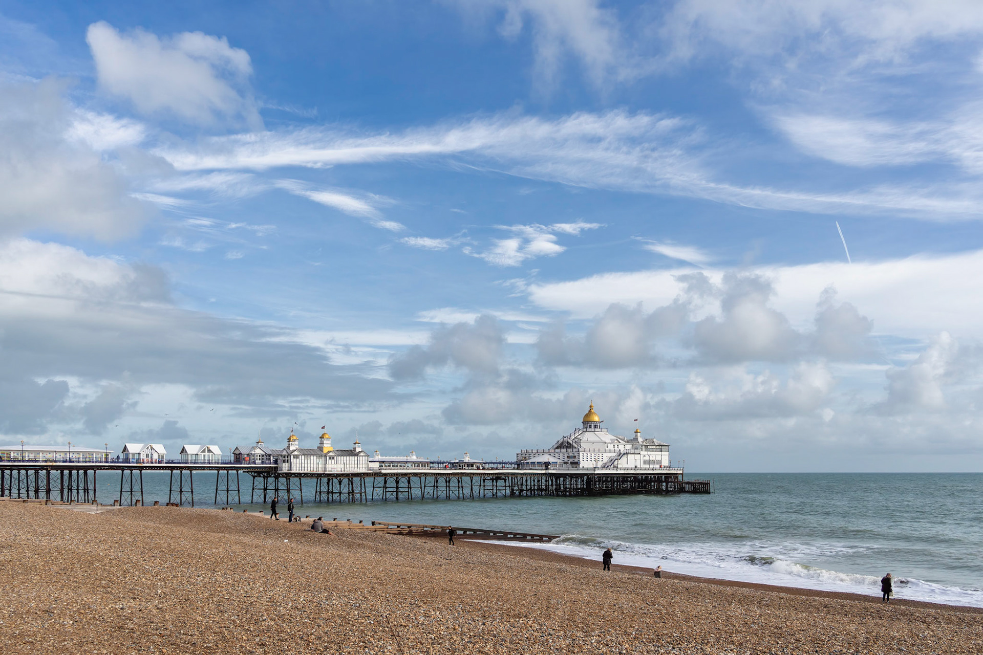 EASTBOURNE, EAST SUSSEX, UK - OCTOBER 22 : View of Eastbourne Pier in East Sussex on October 22, 2022. Unidentified people