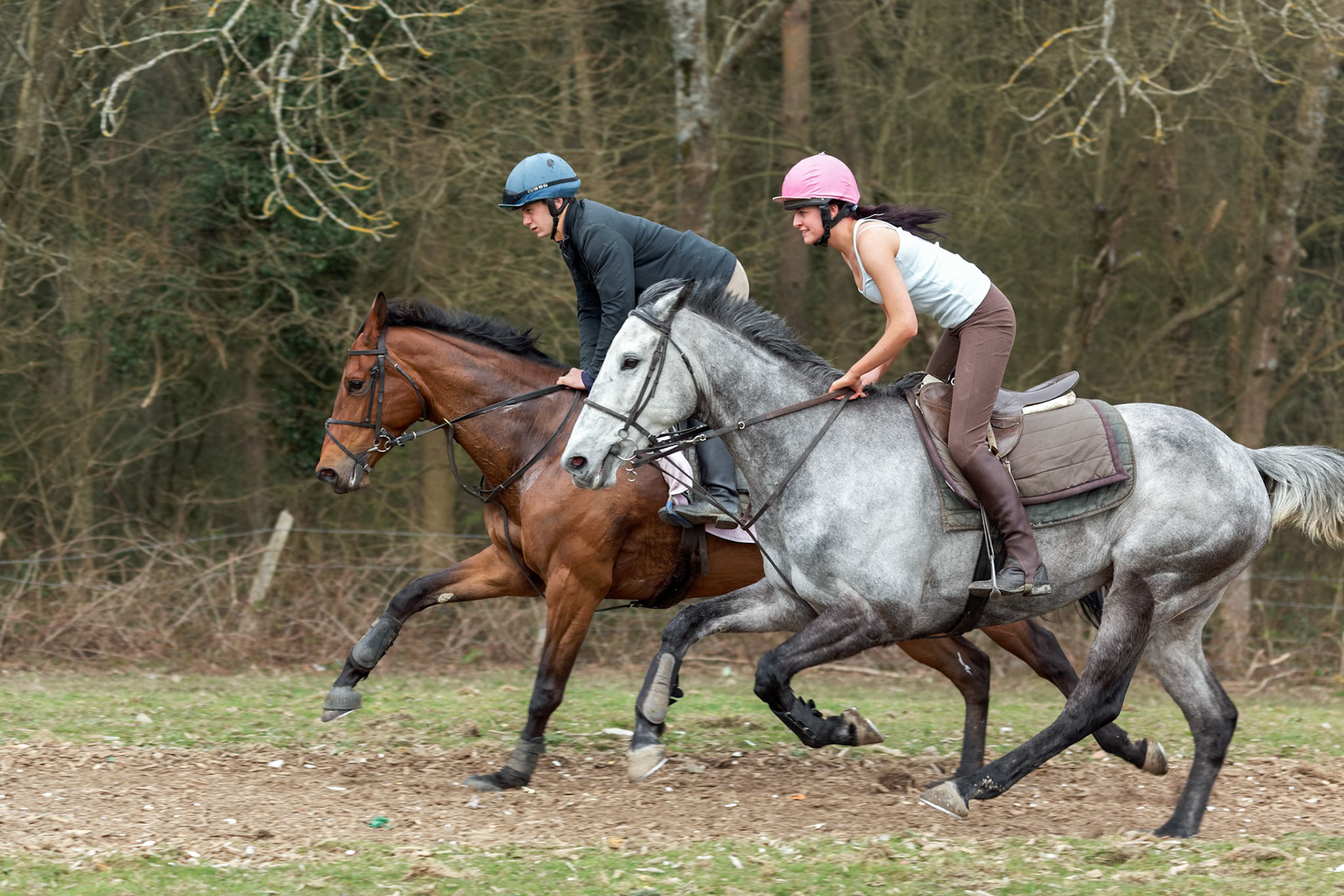 ASHURSTWOOD, WEST SUSSEX/UK - MARCH 26 : Horse Riding near Ashurstwood West Sussex on March 26, 2011. Two unidentified people