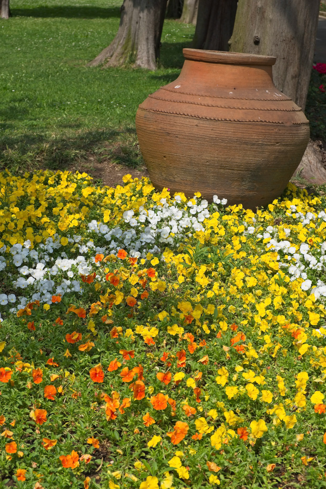 ISTANBUL, TURKEY - MAY 27 : Urn and flowers in the garden of Topkapi Palace and Museum in Istanbul Turkey on May 27, 2018