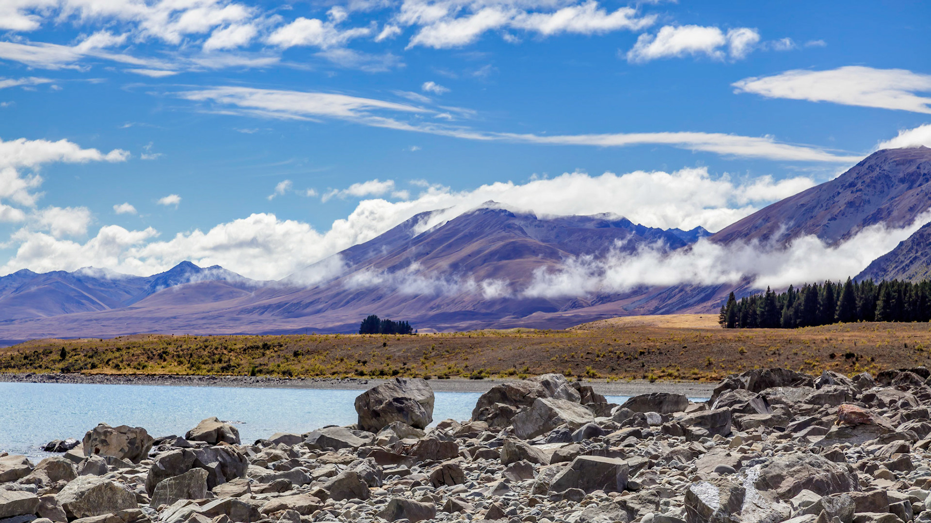 The rocky shore of Lake Tekapo