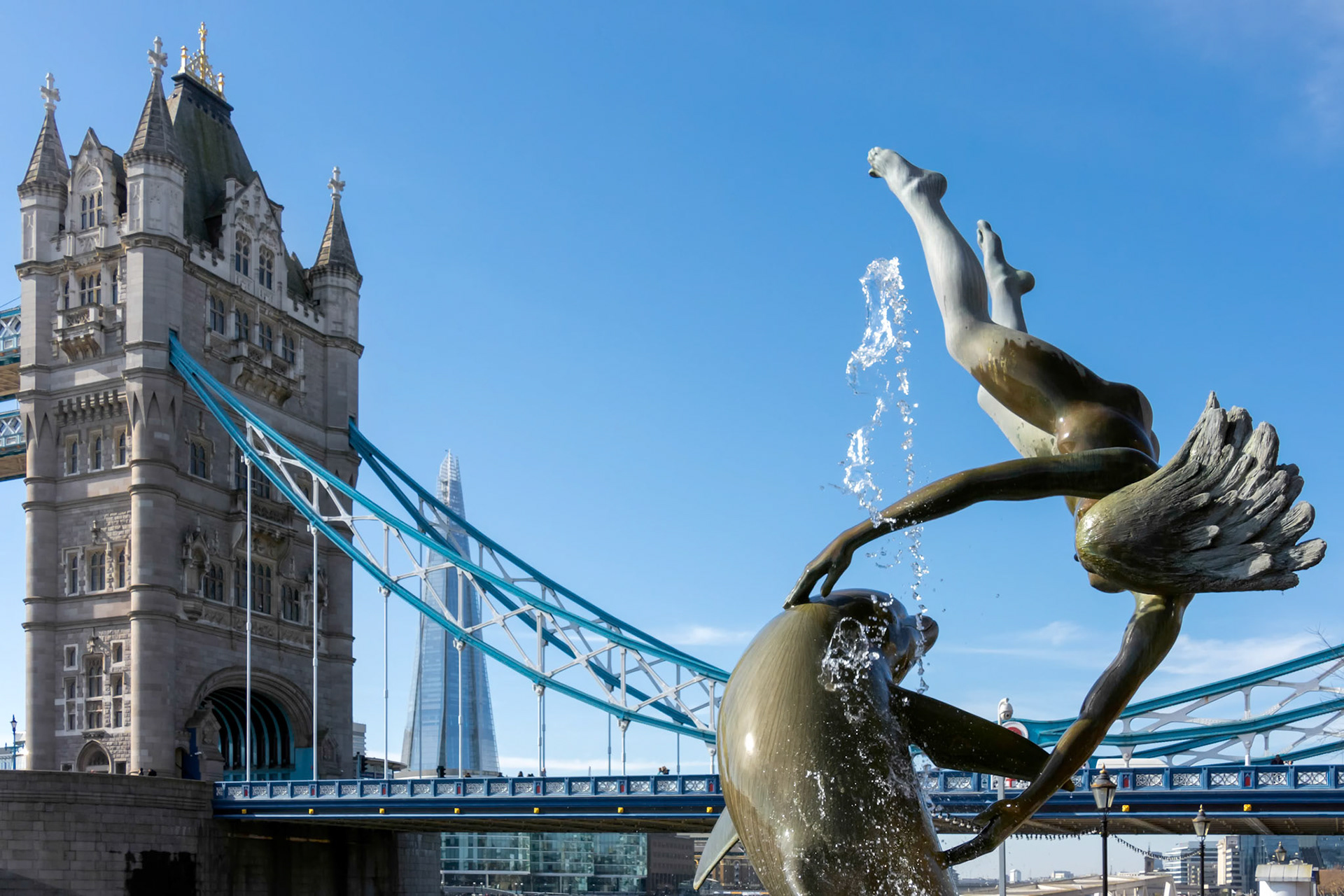 David Wayne Sculpture "Girl with the dolphin" next to Tower Bridge in London