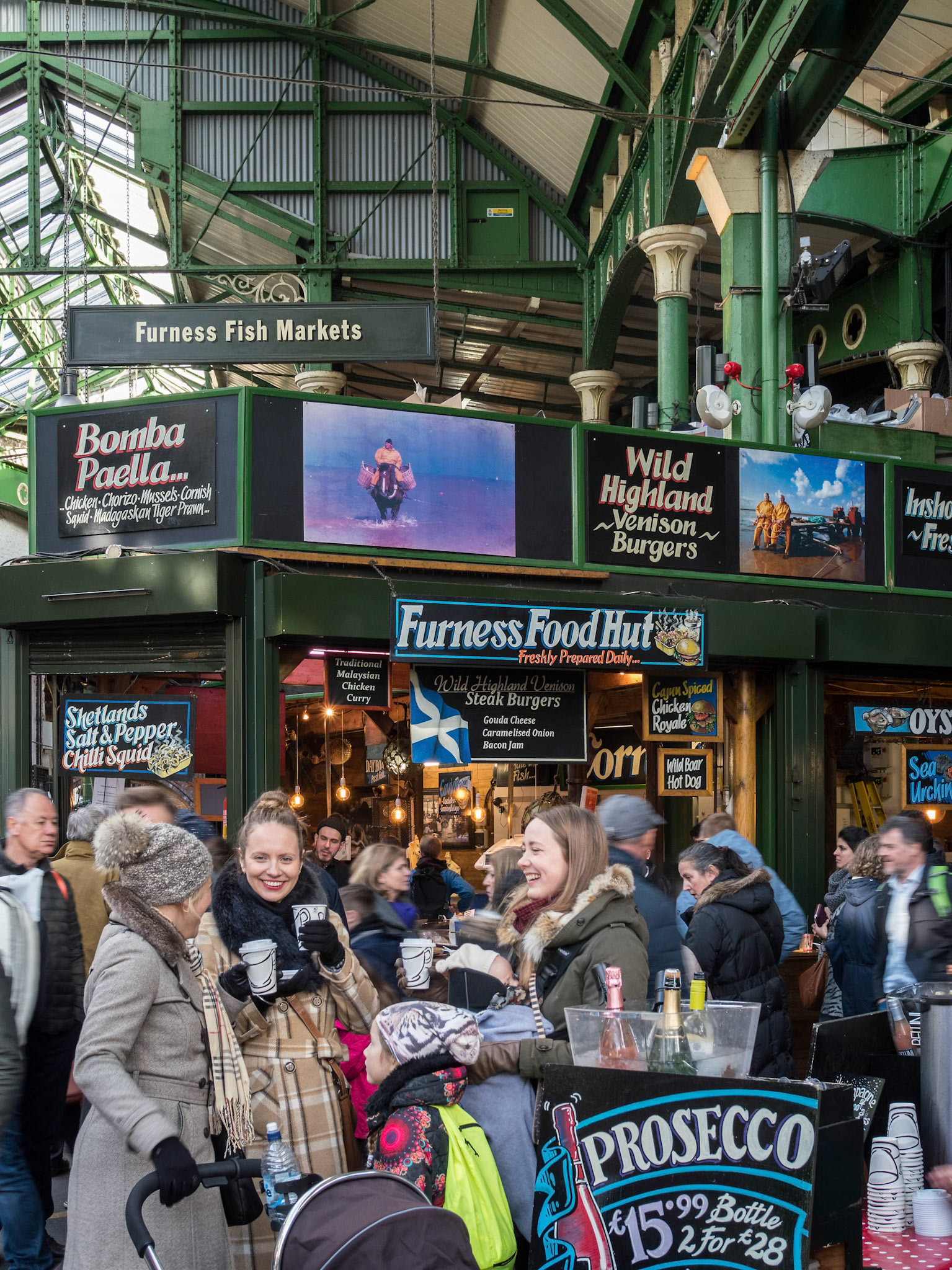 People Enjoying Themselves in Borough Market