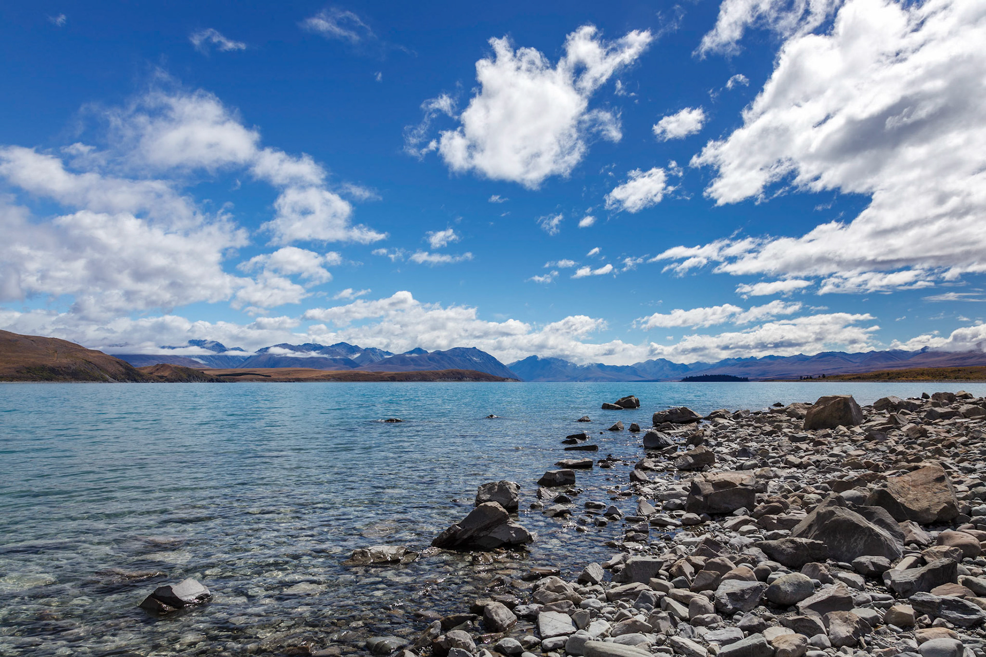 The rocky shore of Lake Tekapo