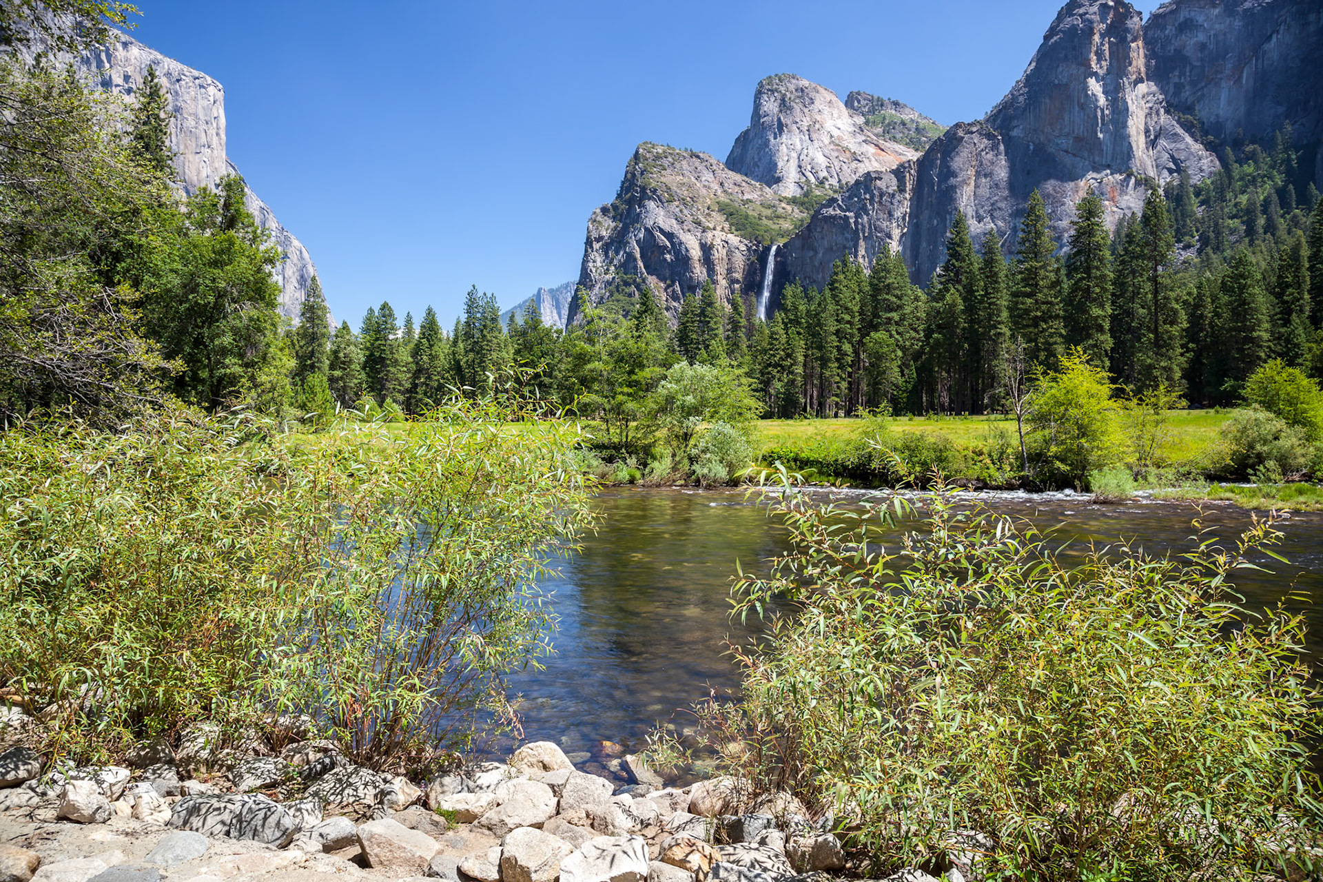 View across the Merced River to the mountains in Yosemite National Park