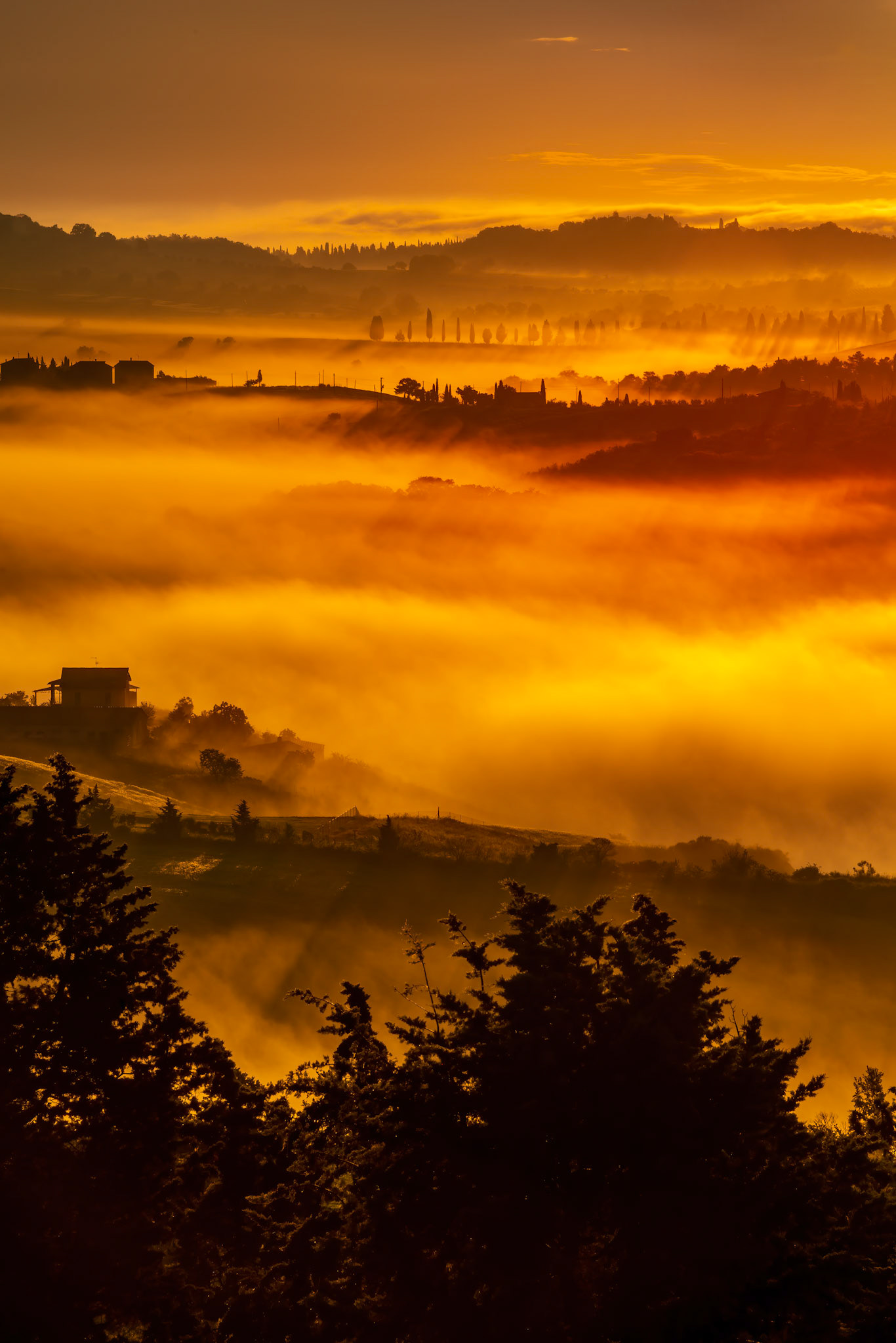 PIENZA, TUSCANY, ITALY - MAY 22 : Sunrise over Val d'Orcia in Tuscany on May 22, 2013