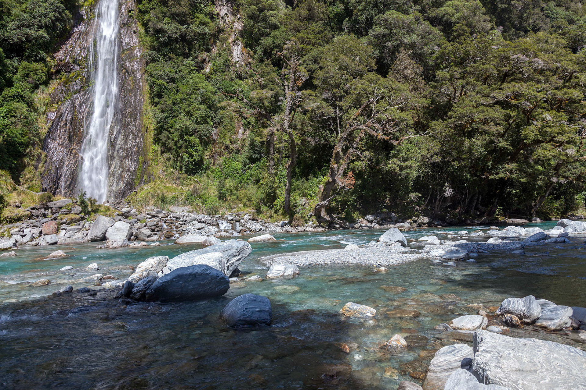 Scenic view of Thunder Creek Falls in New Zealand