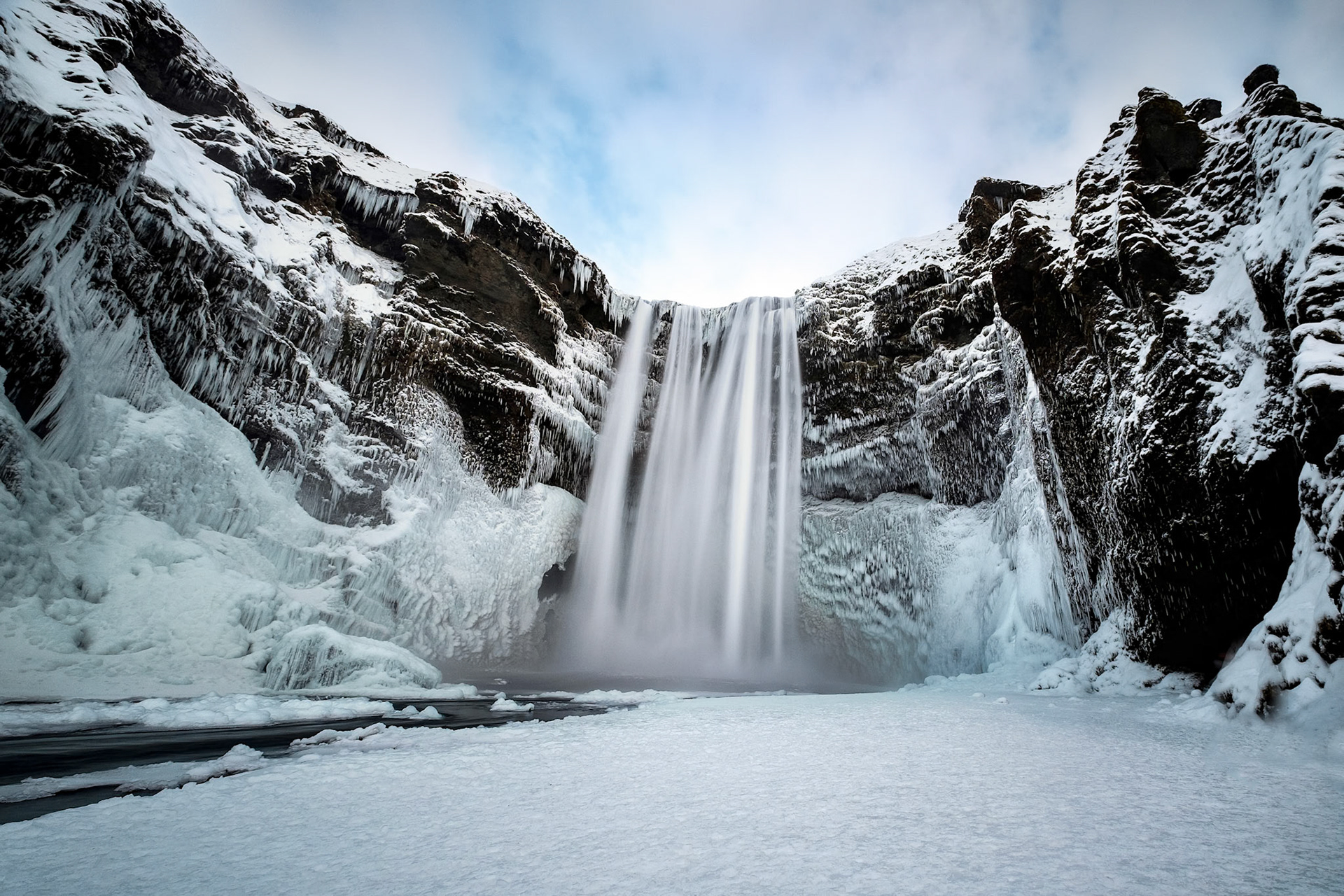View of Skogafoss Waterfall in Winter
