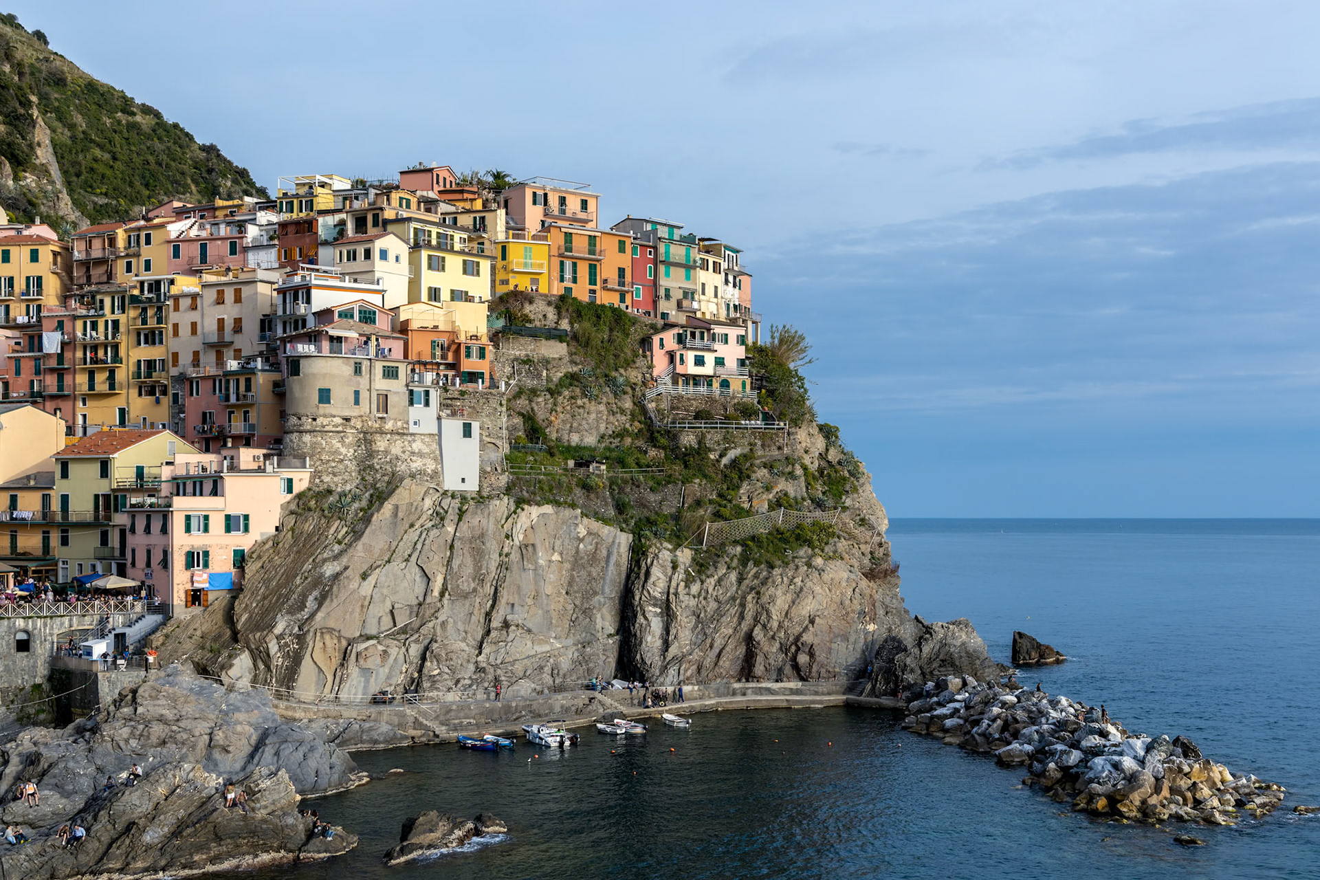 MANAROLA, LIGURIA/ITALY  - APRIL 21 : Coastal view at dusk of Manarola Liguria Italy on April 21, 2019. Unidentified people