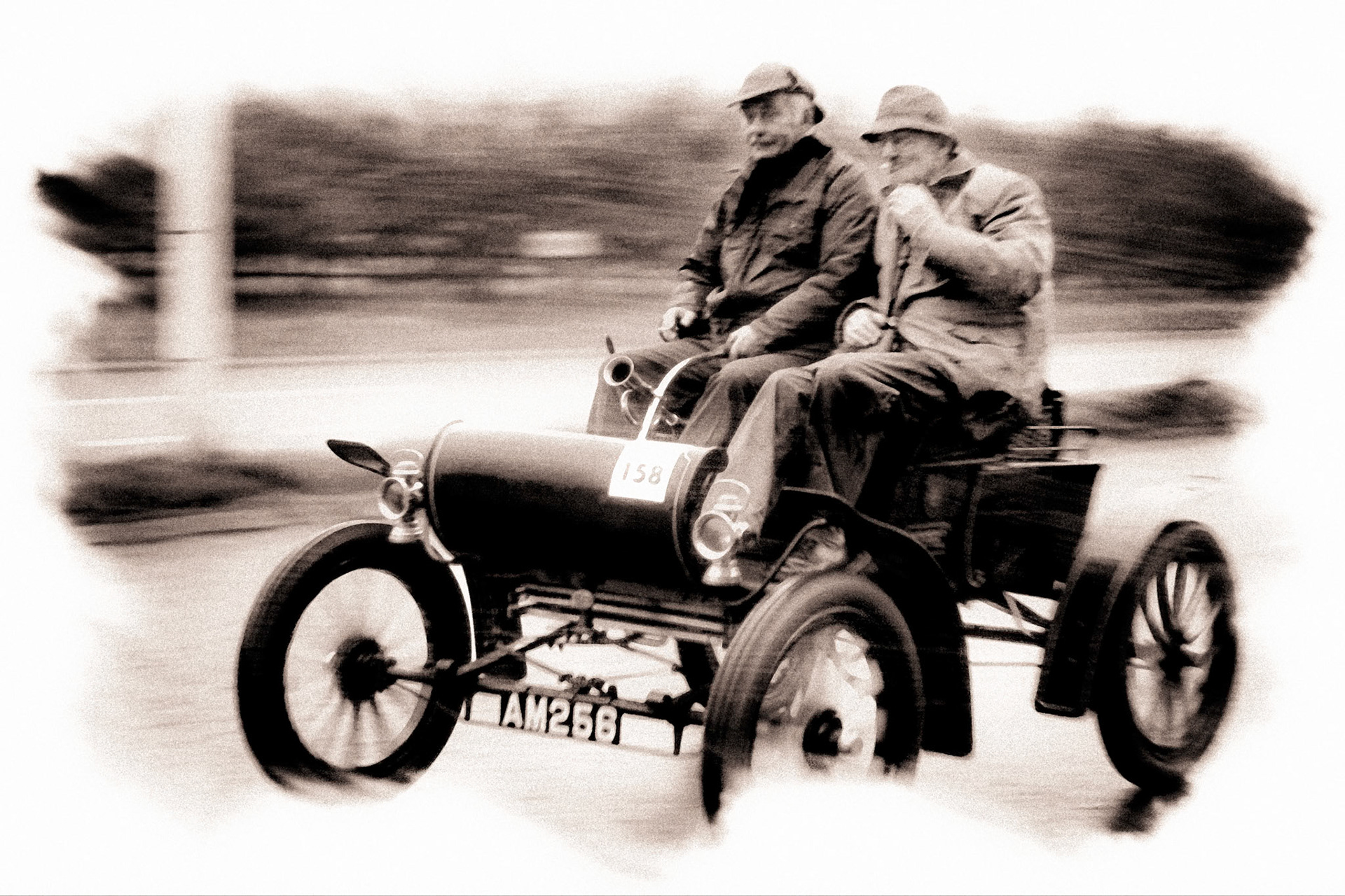 Old Codgers in a Vintage Car Racing to Brighton