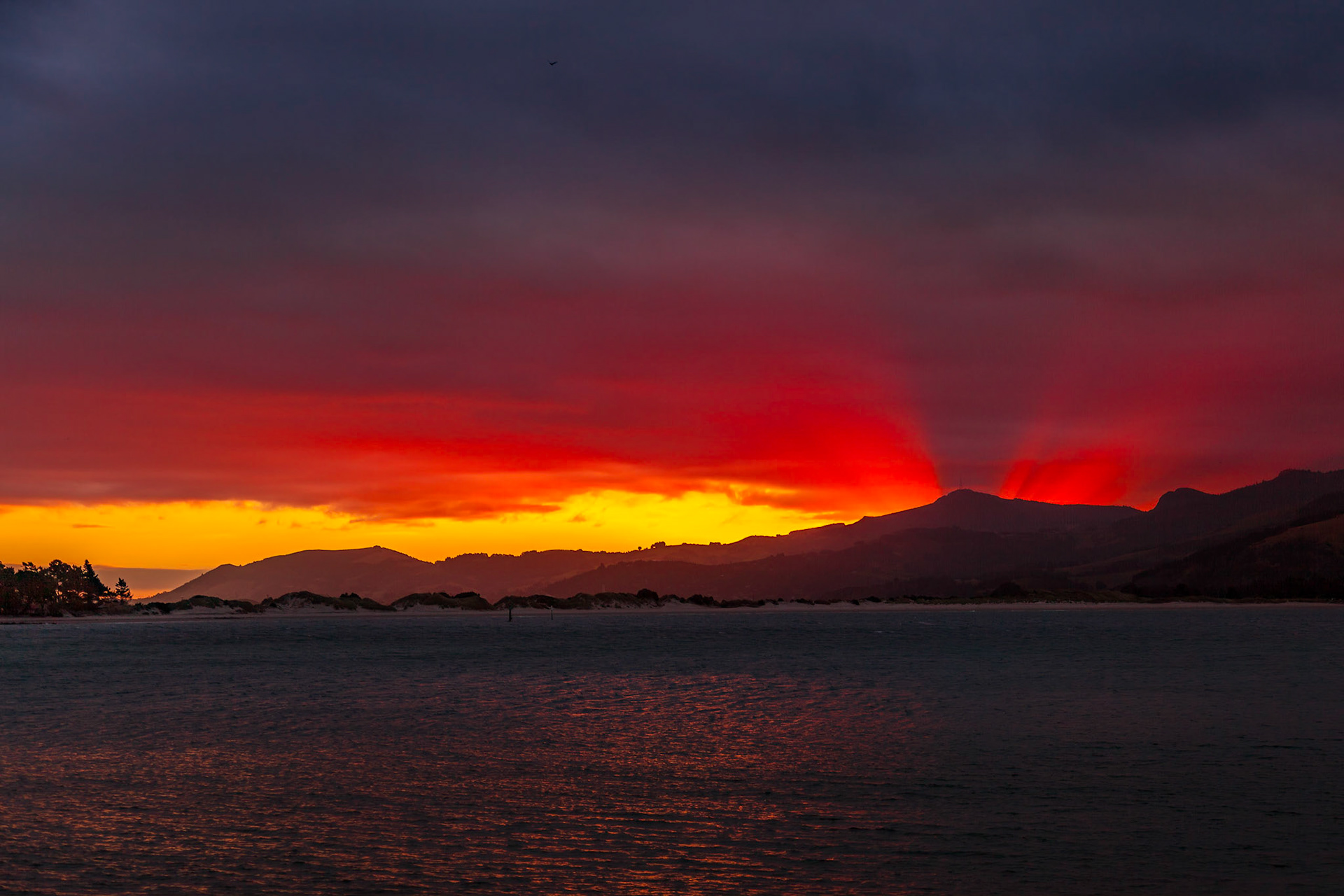 Sunset over Pilot Bay in New Zealand