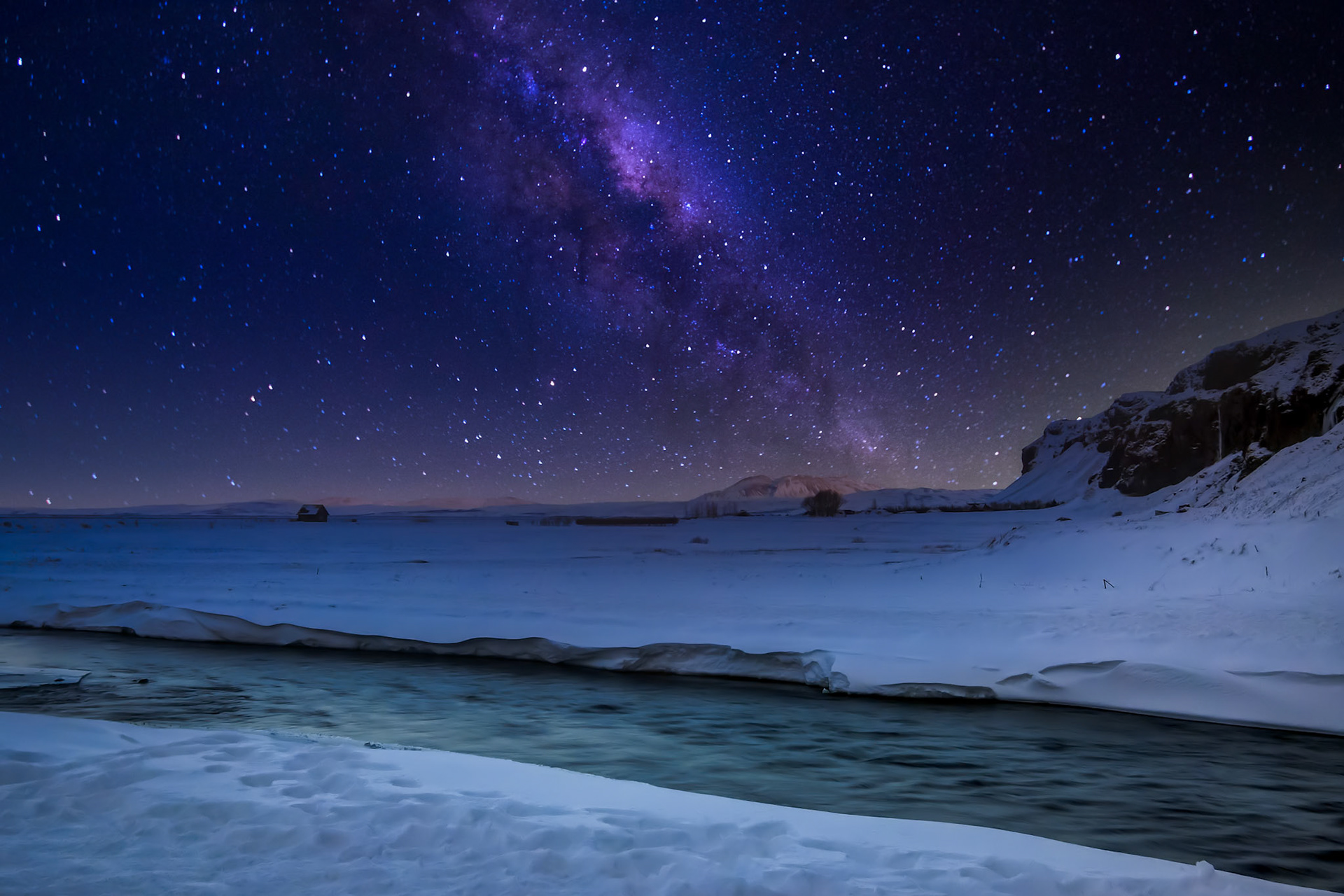 Starry sky at Seljalandfoss Iceland in Winter