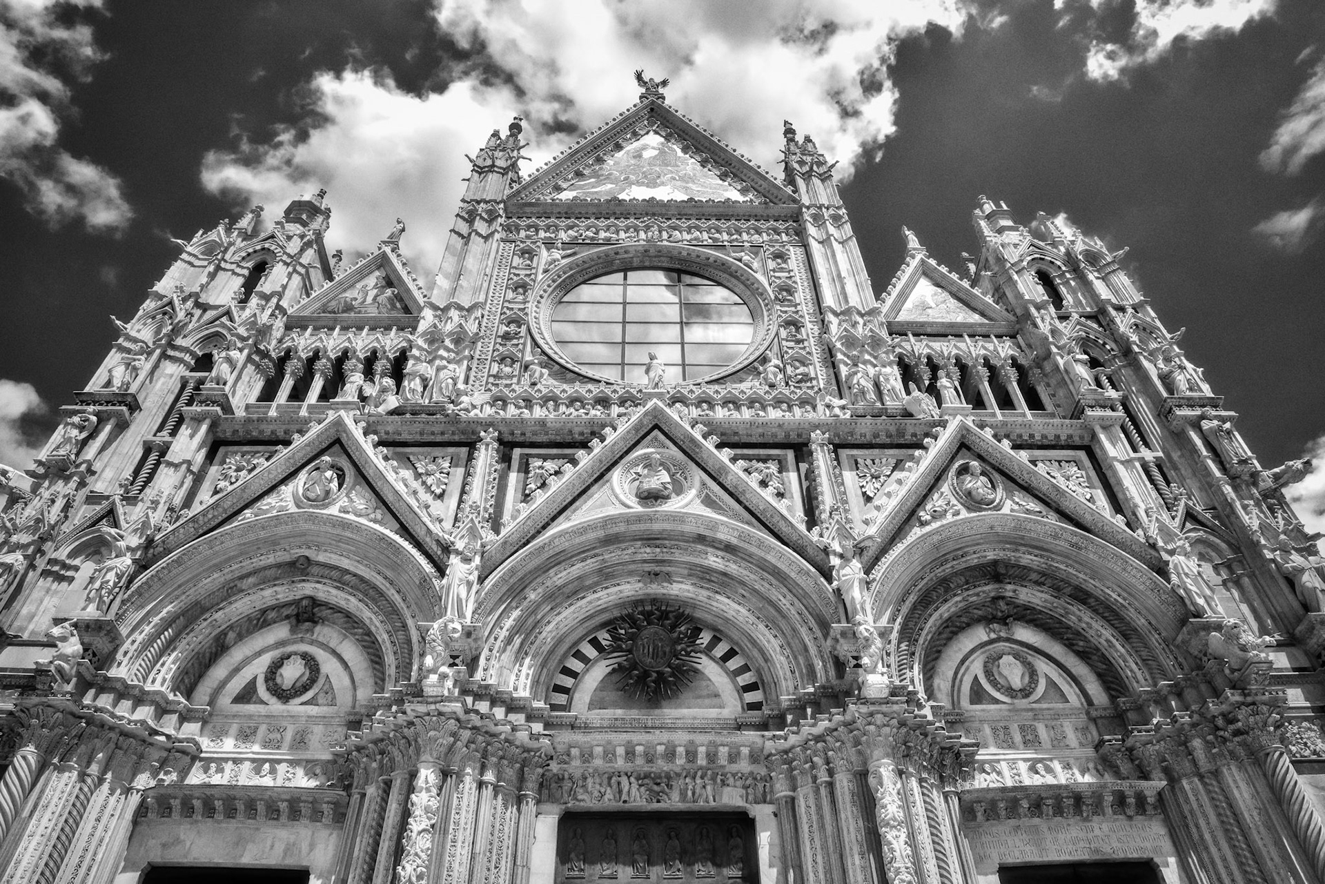 SIENA, TUSCANY, ITALY - MAY 18 : Facade of the Cathedral in Siena, Tuscany, Italy on May 18, 2013