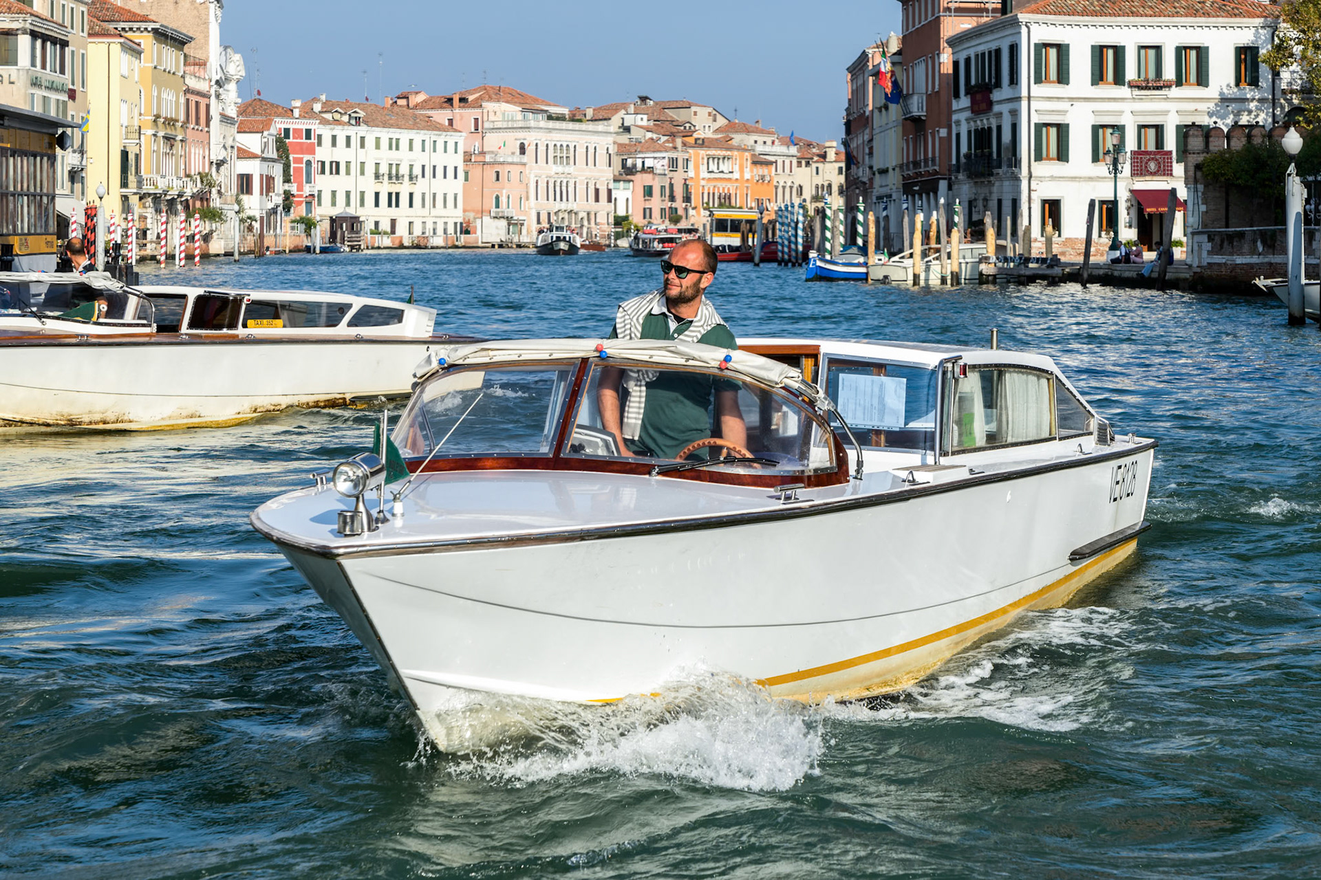 Motorboat Cruising down the Grand Canal in Venice