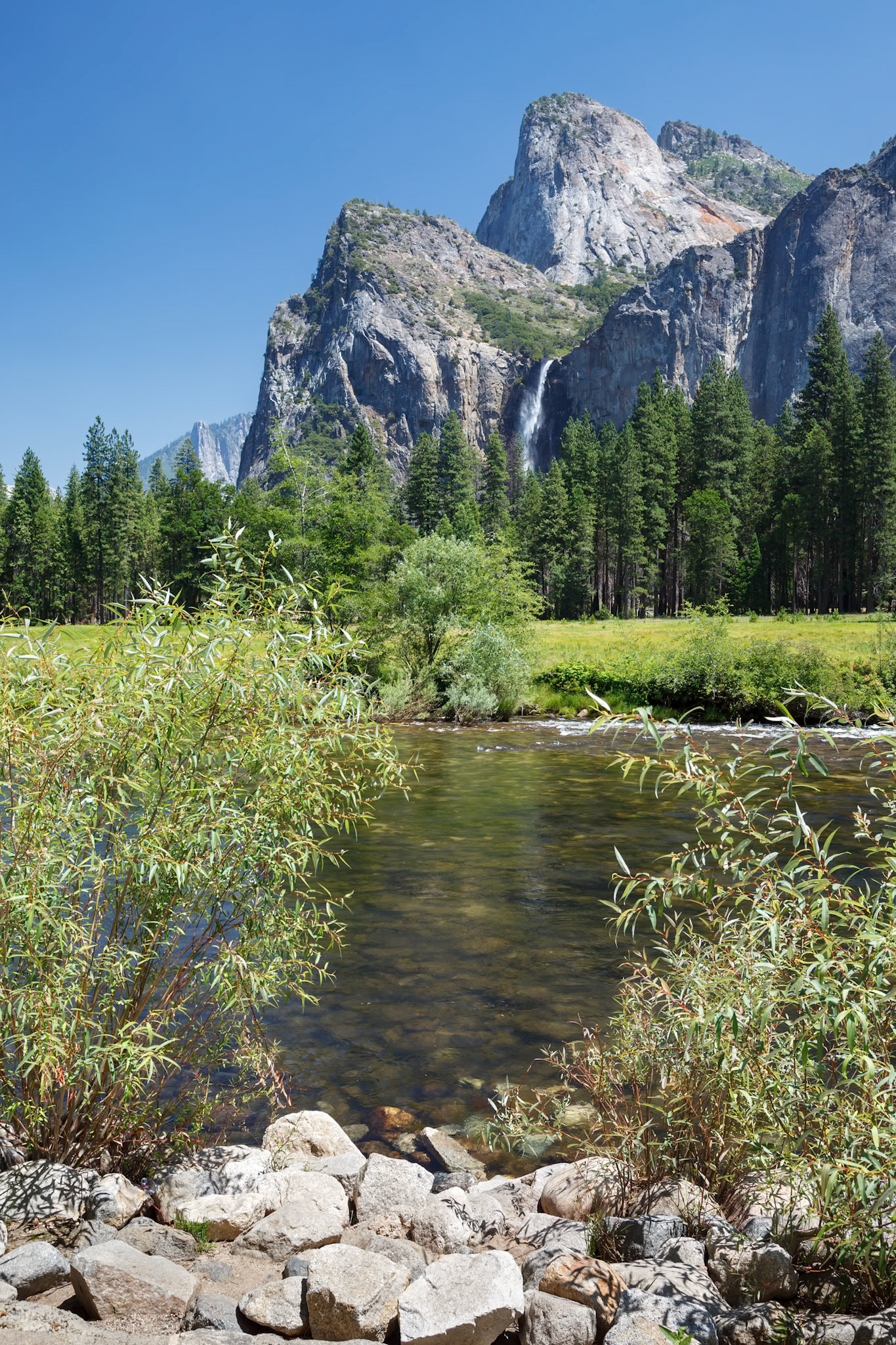 View across the Merced River to the mountains in Yosemite National Park