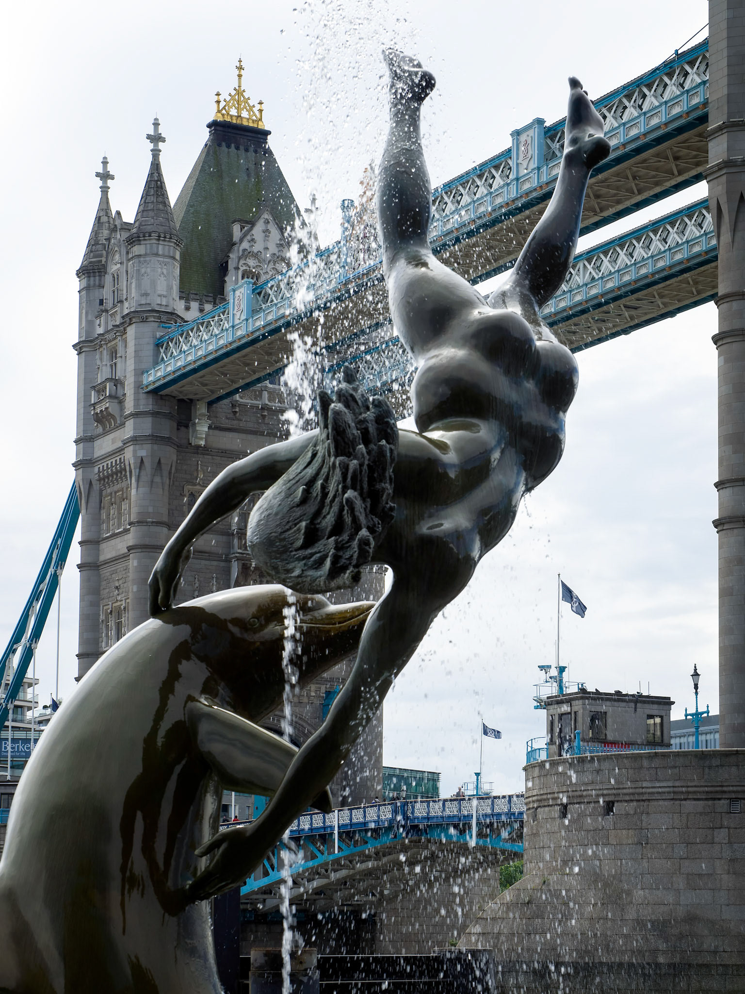 David Wayne Sculpture Girl with the Dolphin next to Tower Bridge in London