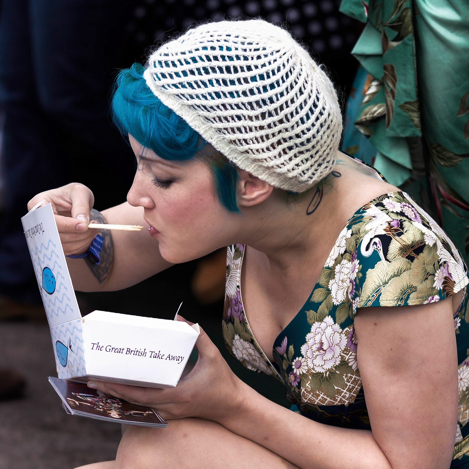 Lady enjoying a take away at the Goodwood Revival