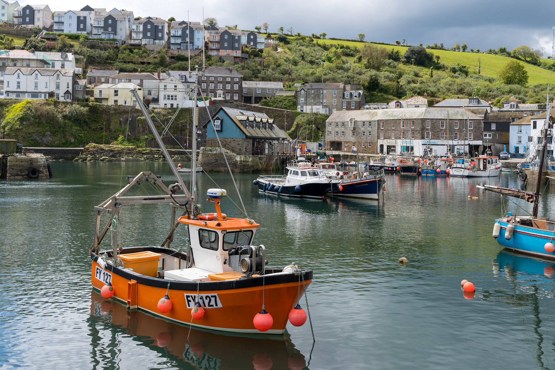 MEVAGISSEY, CORNWALL, UK, MAY 3. View of Mevagissey harbour in Cornwall on May 3, 2024. Unidentified people