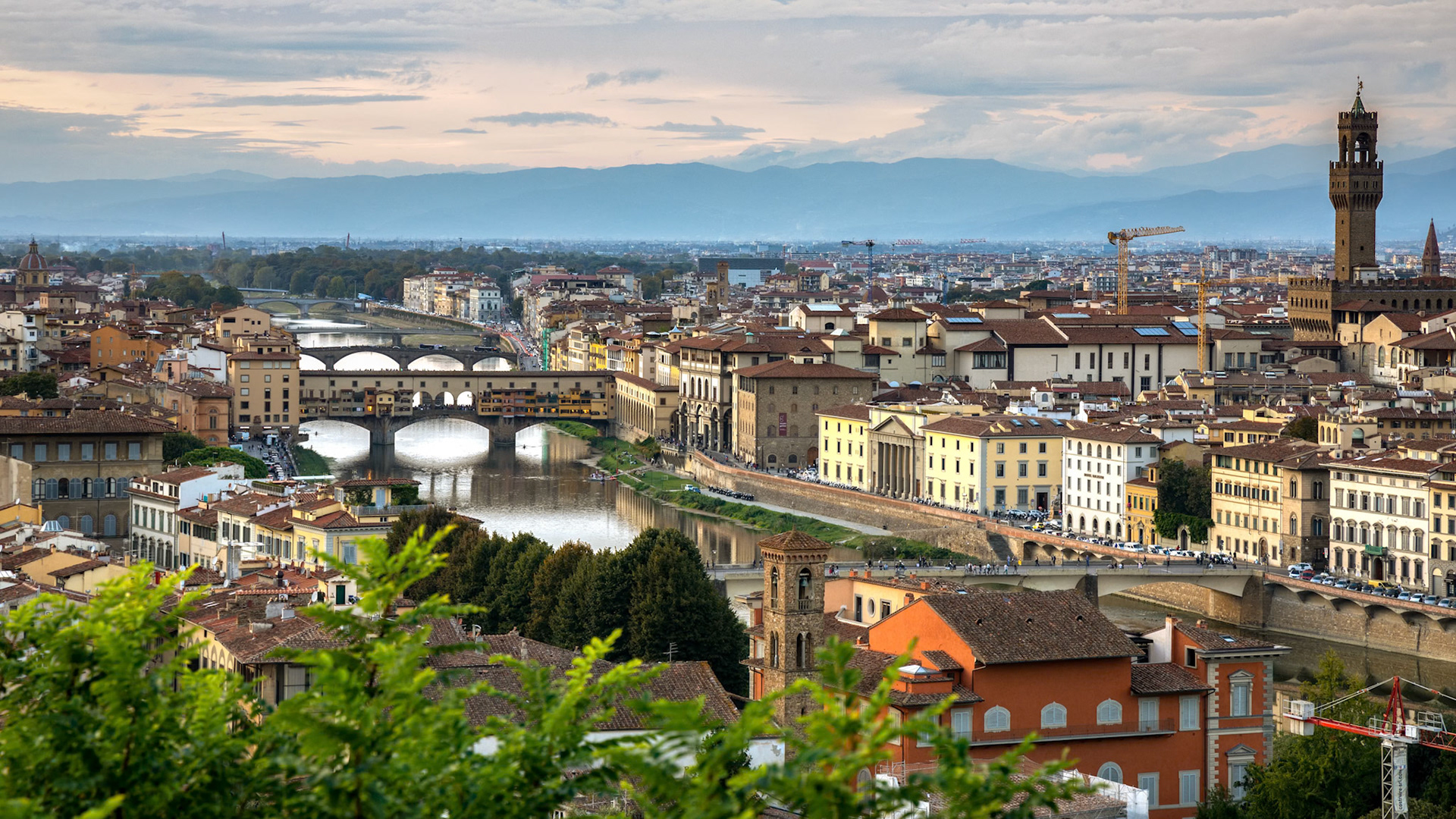 FLORENCE, TUSCANY/ITALY - OCTOBER 18 : View of buildings along and across the River Arno in Florence  on October 18, 2019.