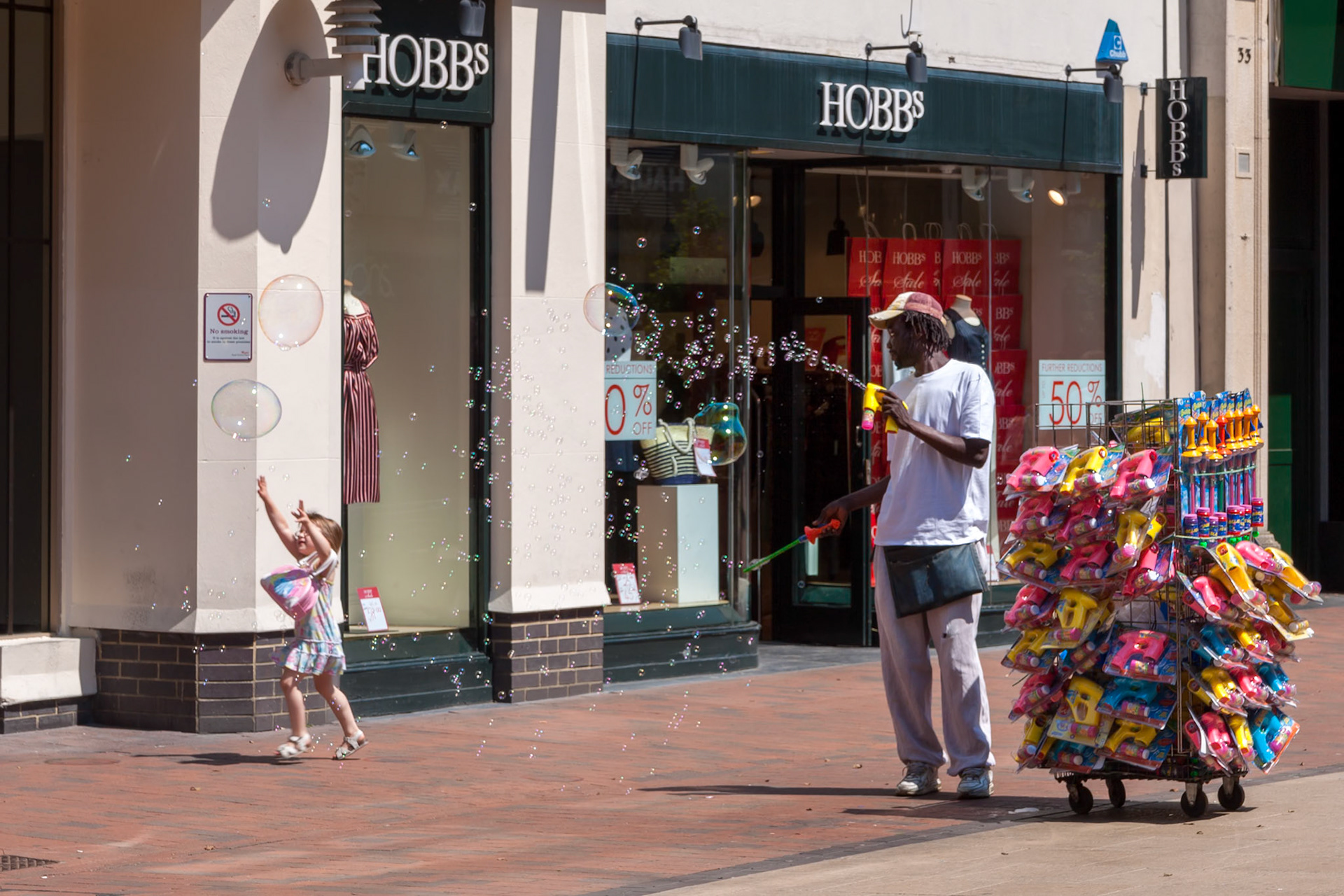 Man Generating Lots of Bubbles in the Shopping Centre at Royal Tunbridge Wells
