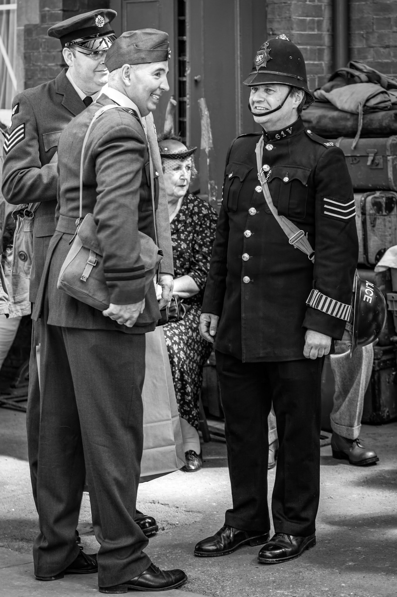 HORSTED KEYNES, SUSSEX/UK - MAY 7 :  Men in uniform at Horsted Keynes Railway Station in Horsted Keynes Sussex on May 7, 2011. Four unidentified people