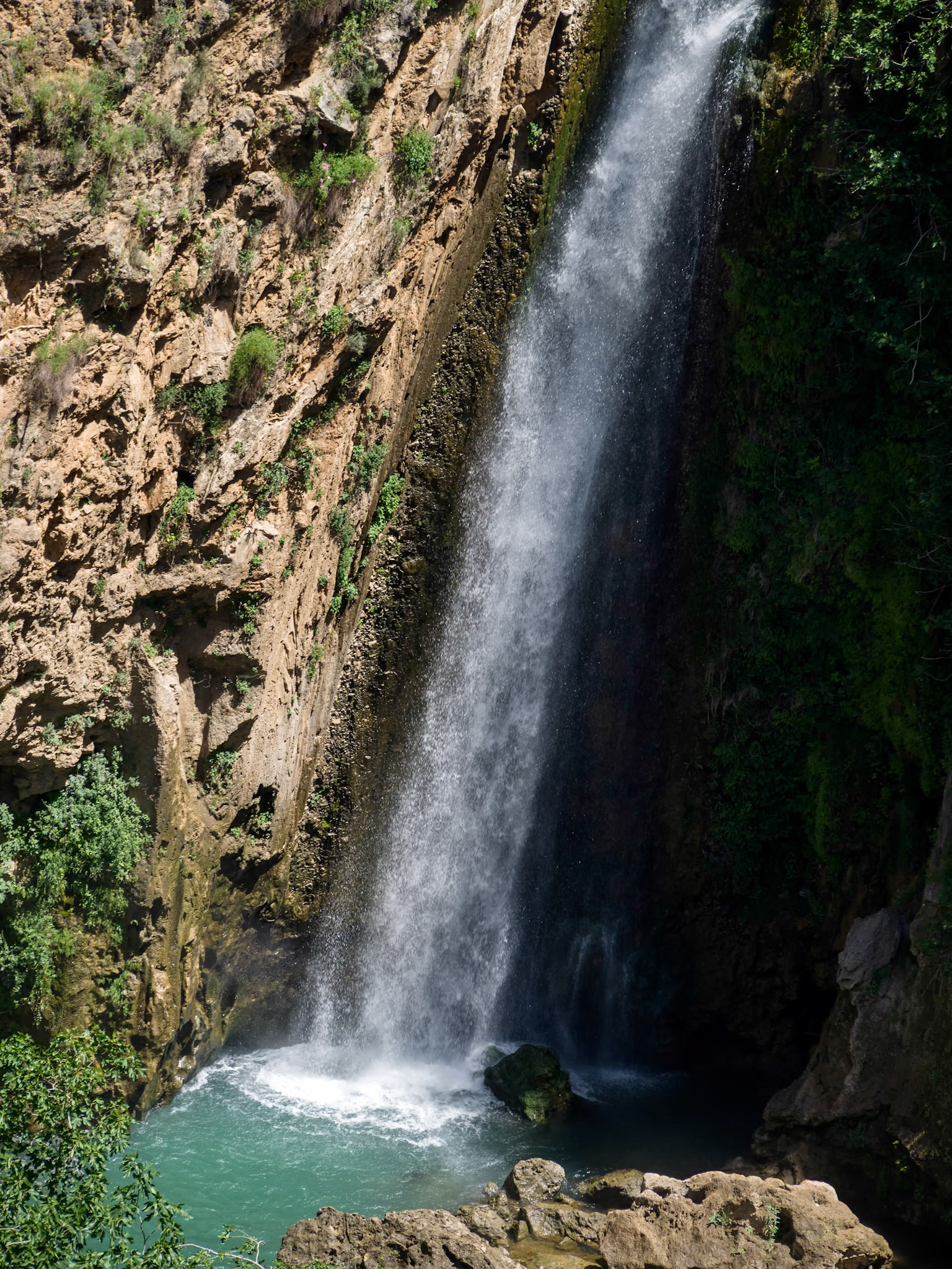 Waterfall below the New Bridge at Ronda Spain