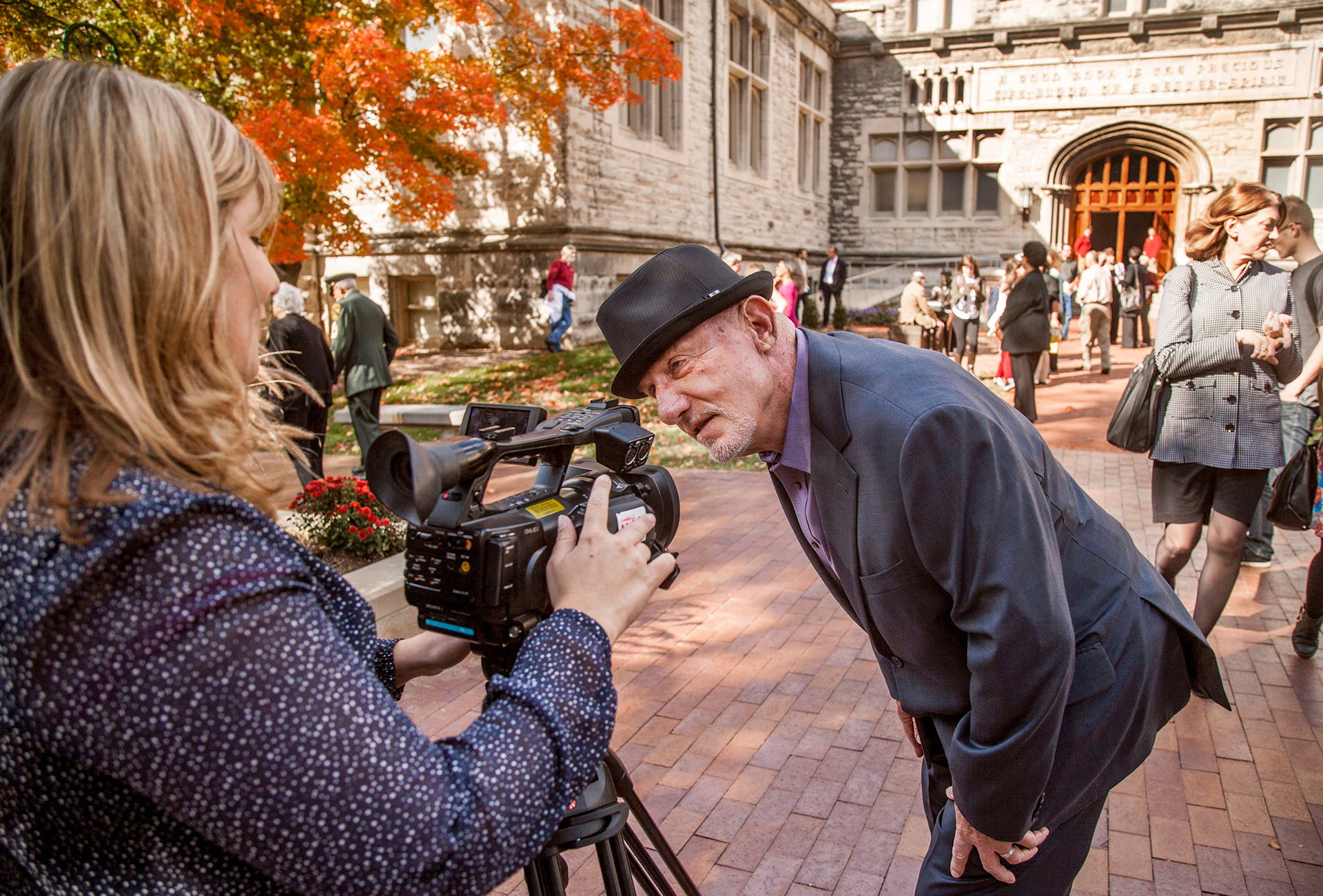 Breaking Bad actor Jonathan Banks mugs in front of a video camera following the ceremony to formally dedicate Indiana University's Media School.