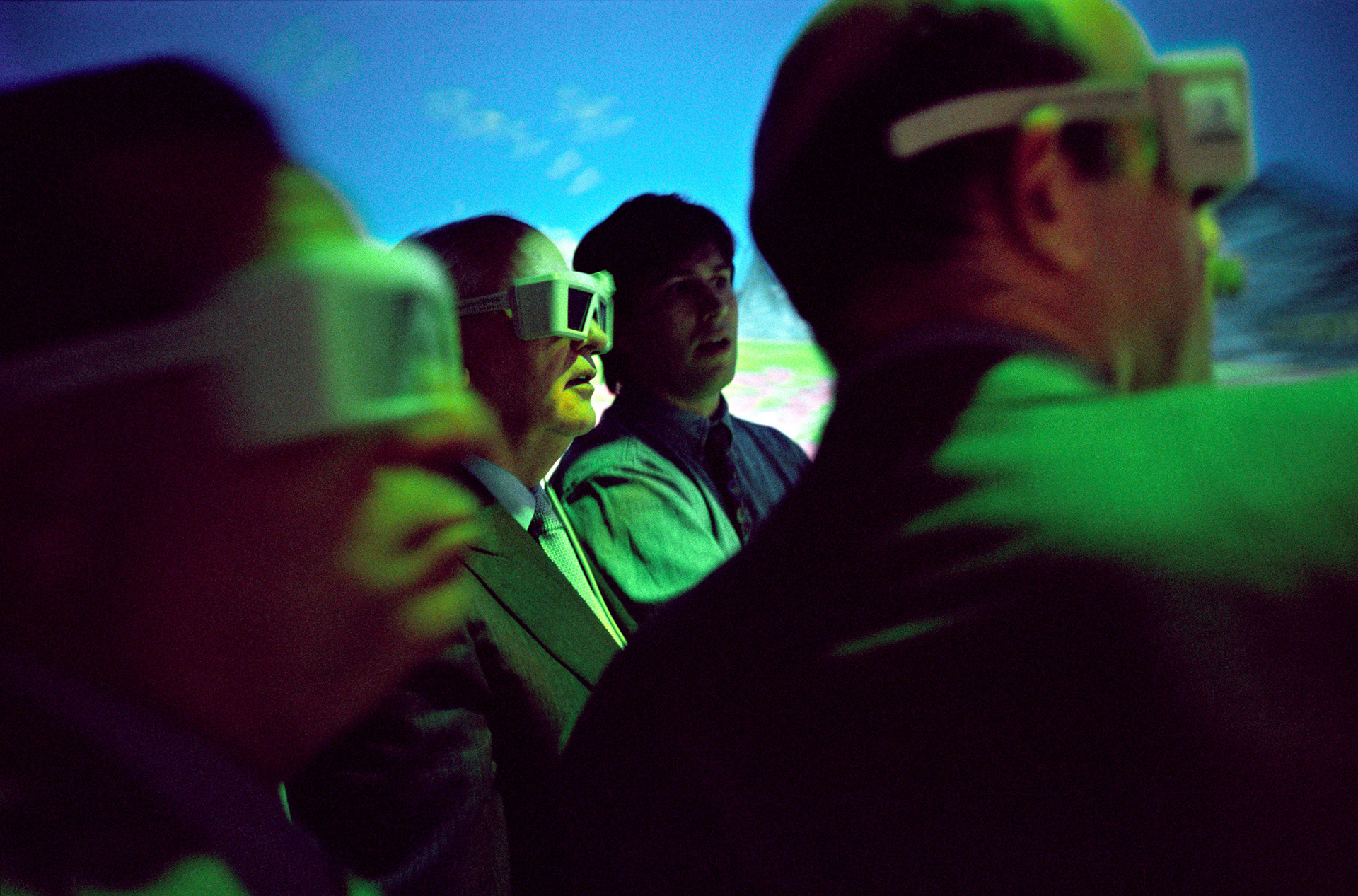 Former Soviet President Mikhail Gorbachev, center with goggles, and his comrades take a virtual tour of the cosmos from computer specialist Eric Wernert at Indiana University.