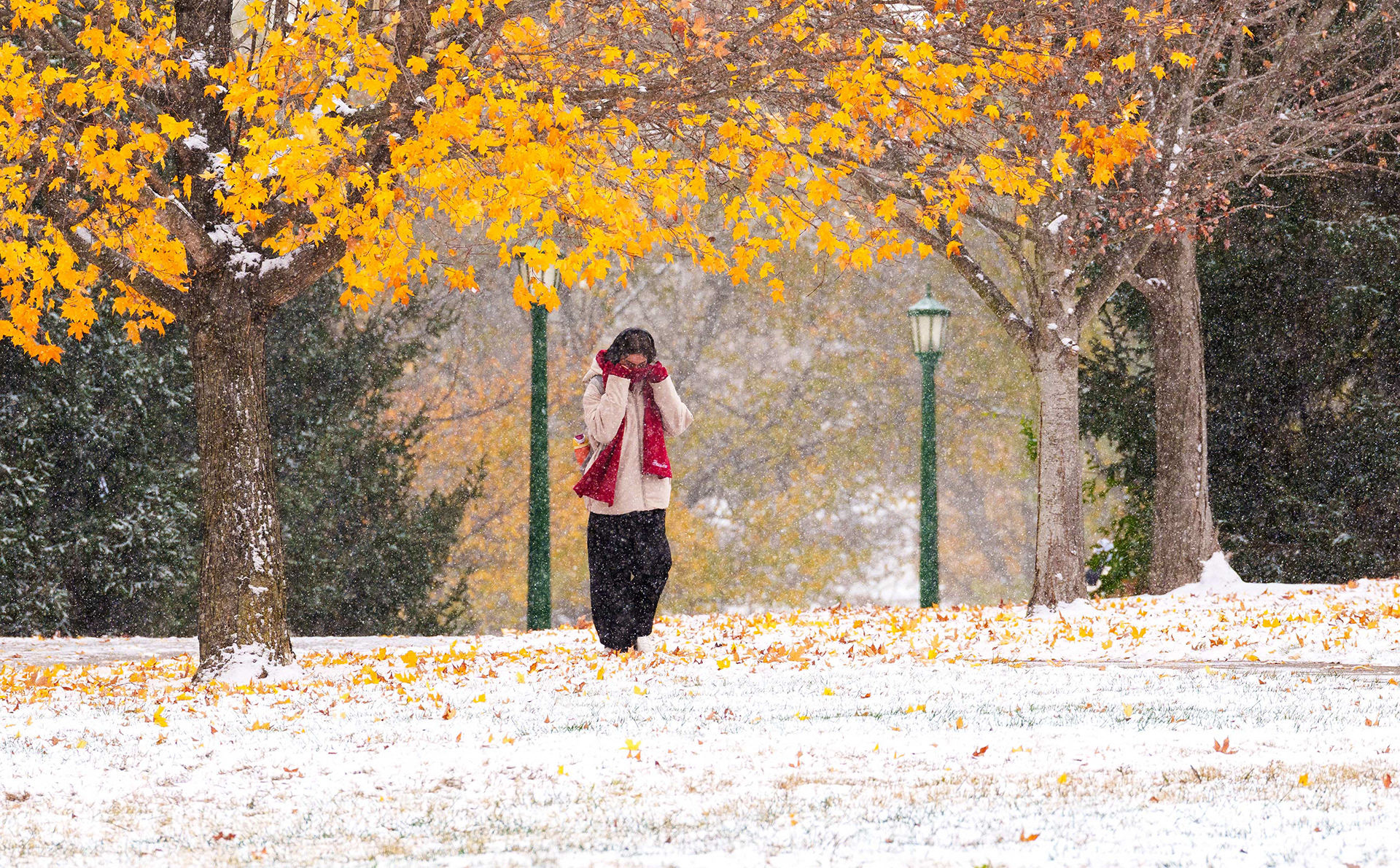 A student braves the sudden winter weather.