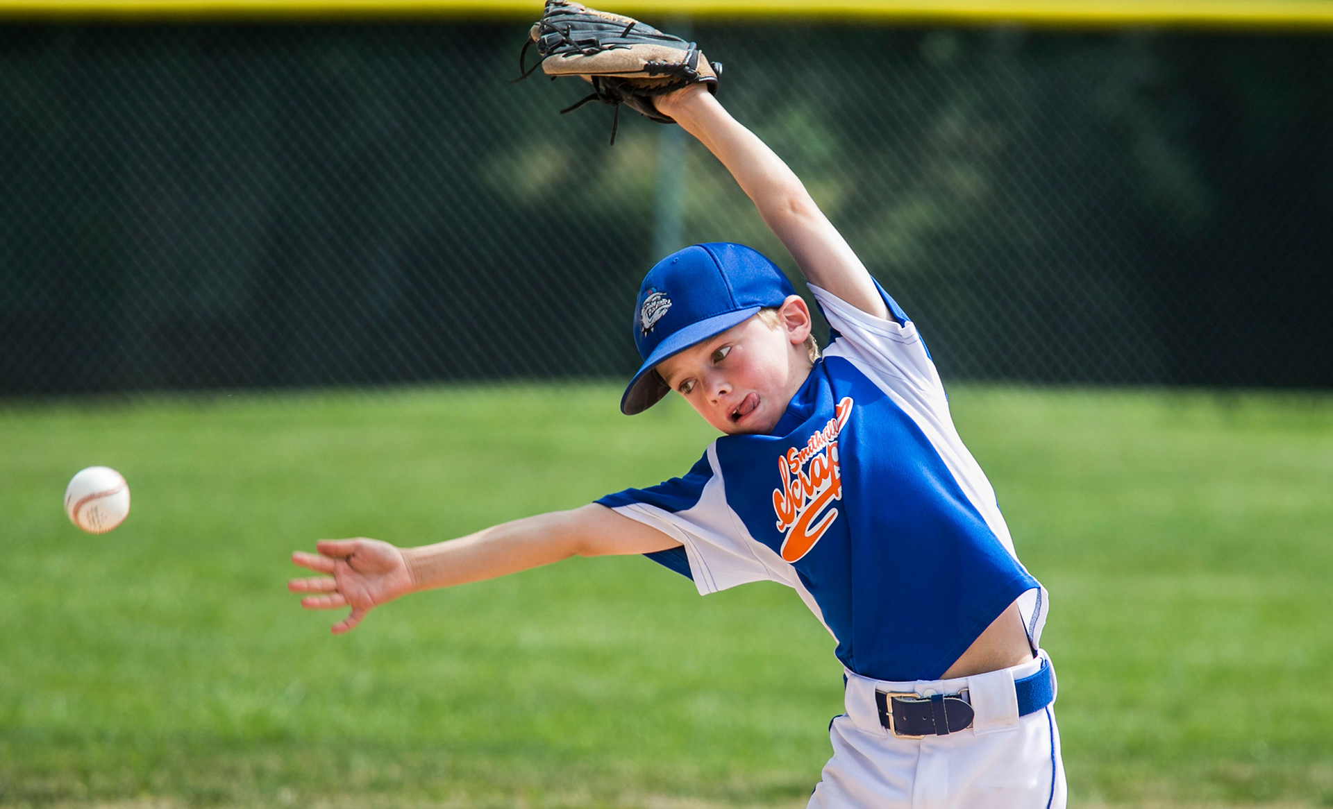 Michael Fabris reaches for a line drive.