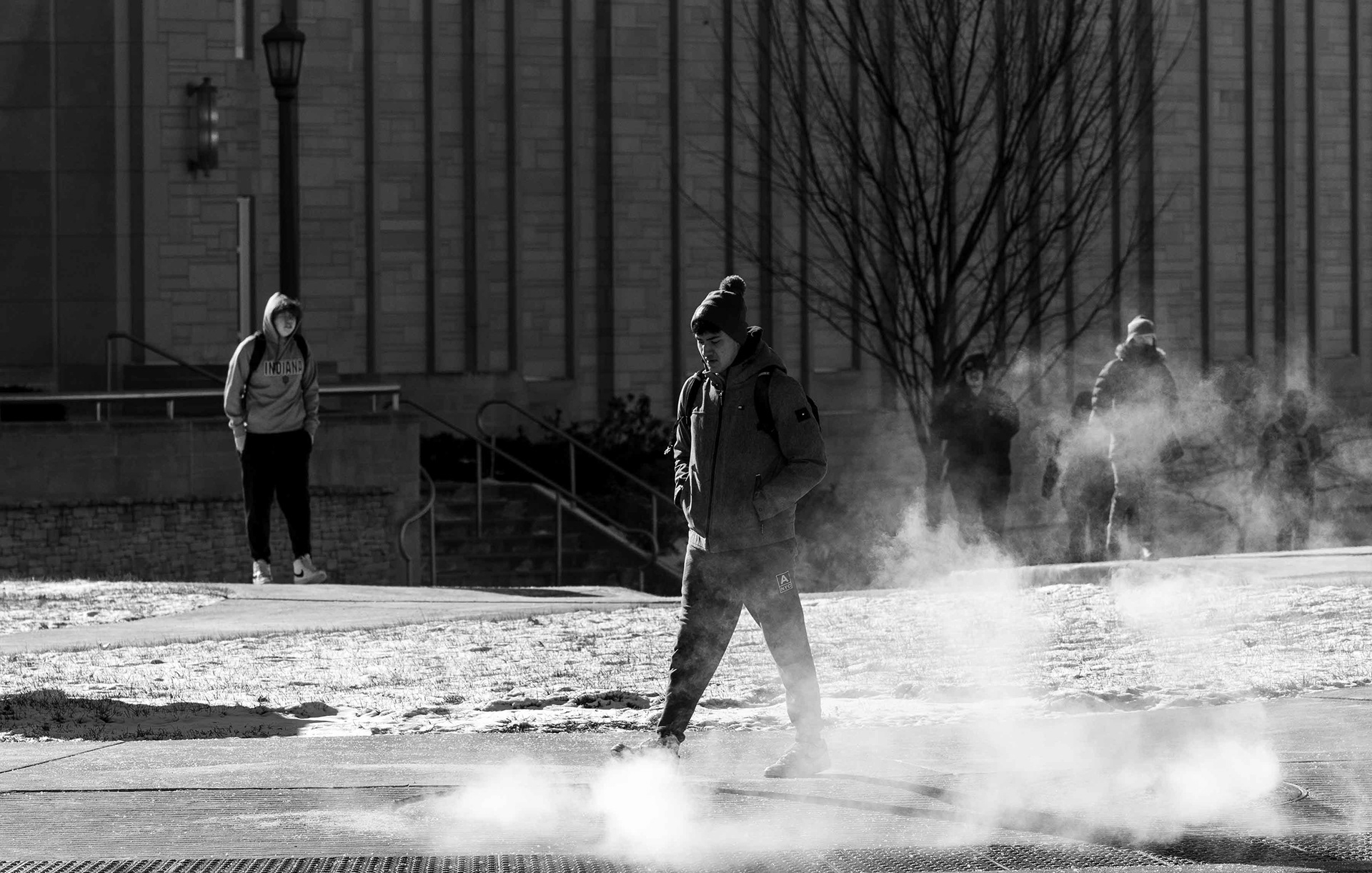 Students navigate campus during a cold snap.