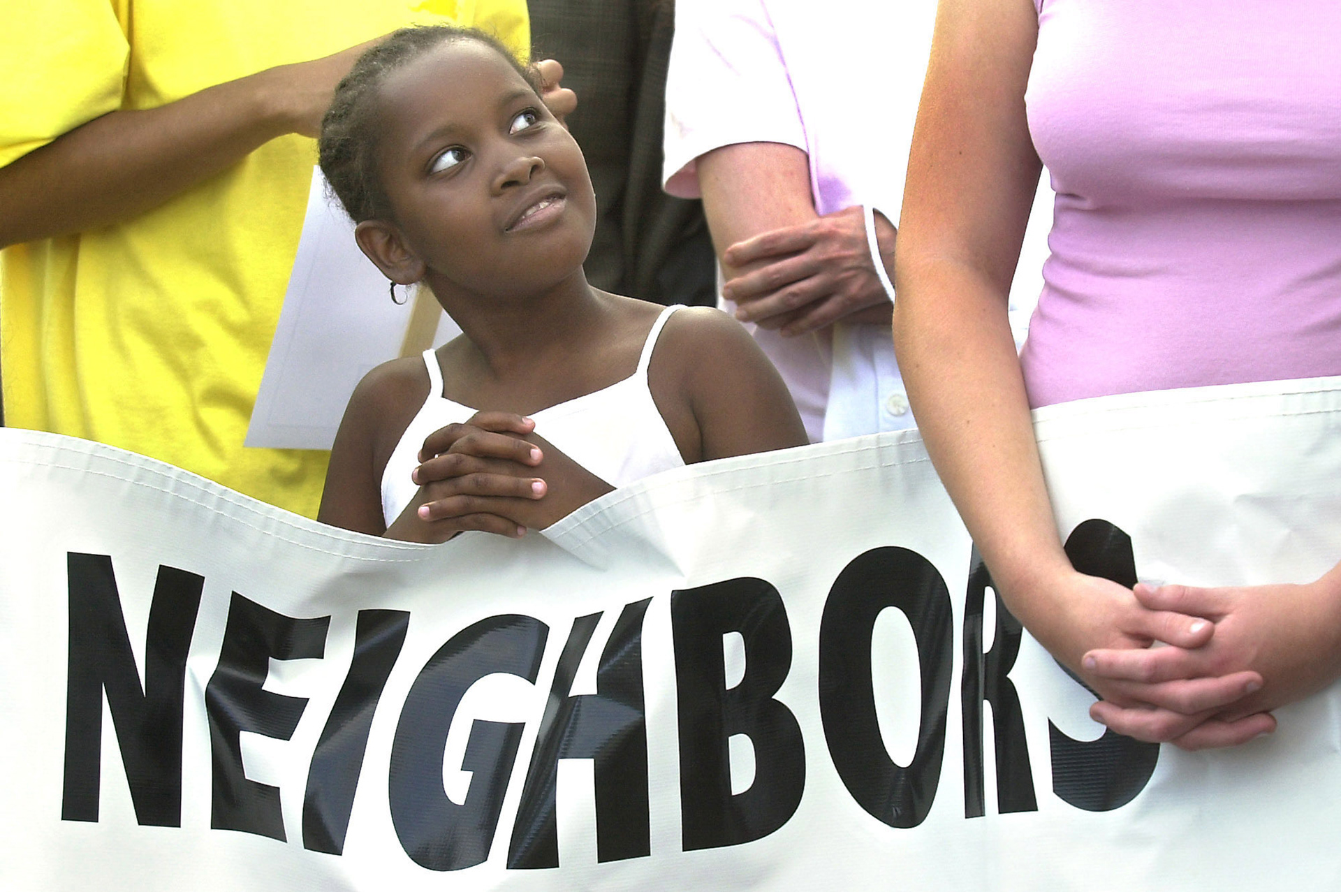 Yasmine Mendonca participates in a prayer and peace march following a summer of violence in Brockton, MA.