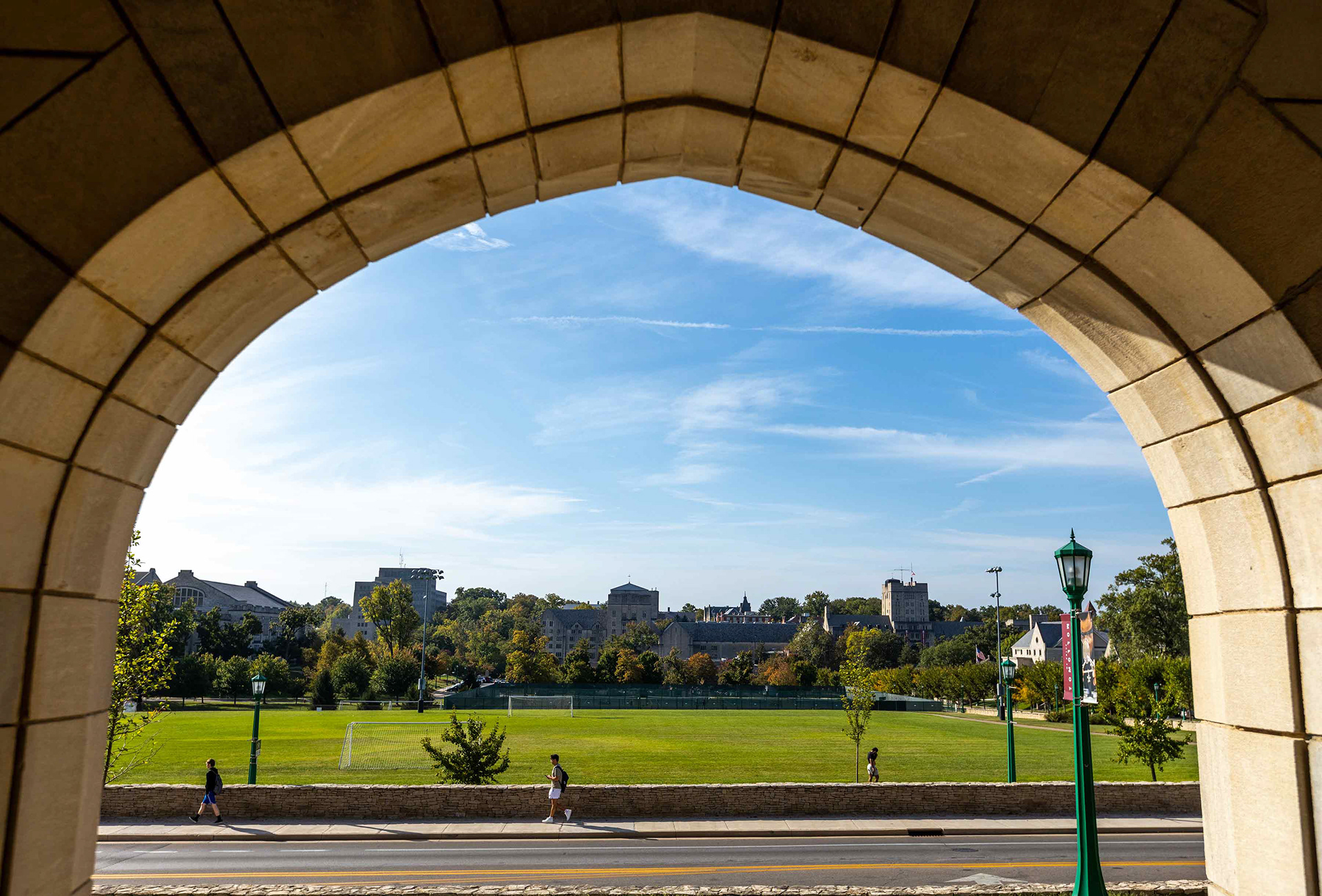 Students cross campus along Tenth Street.