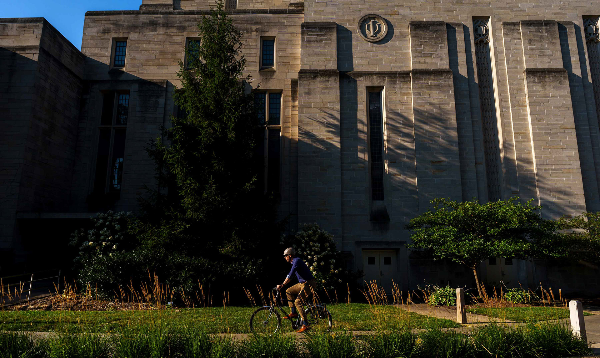 A cyclist near the IU Auditorium.