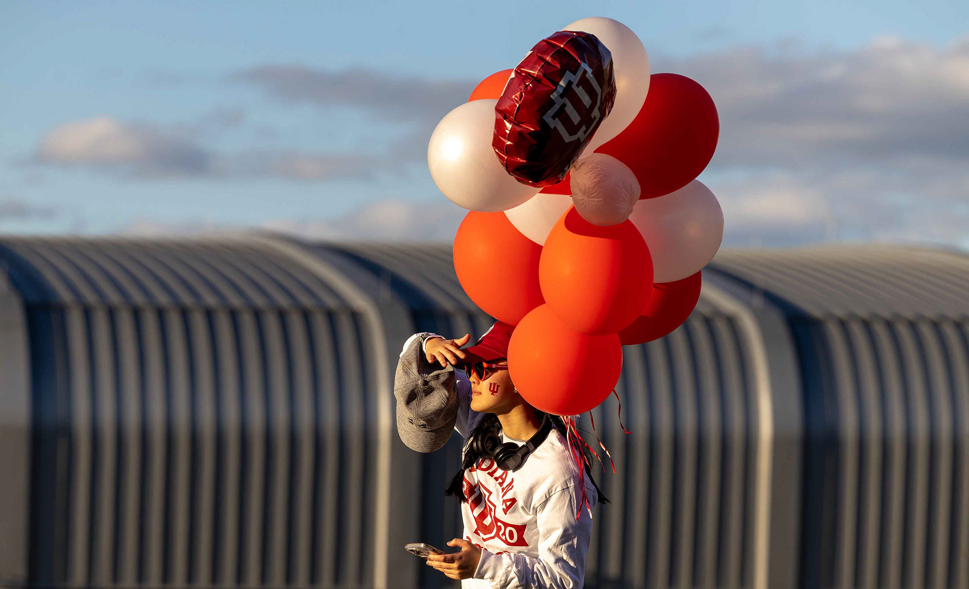 Lidia Yang watches the homecoming parade at IU.