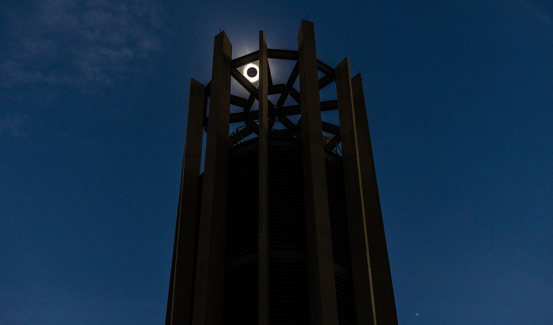 Total eclipse framed in the Metz Bicentennial Carillon.