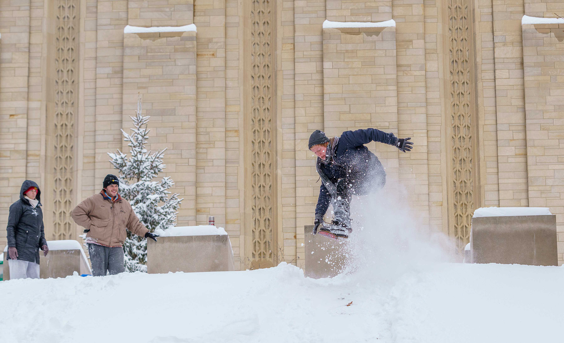 Snowboarding behind the IU Auditorium.