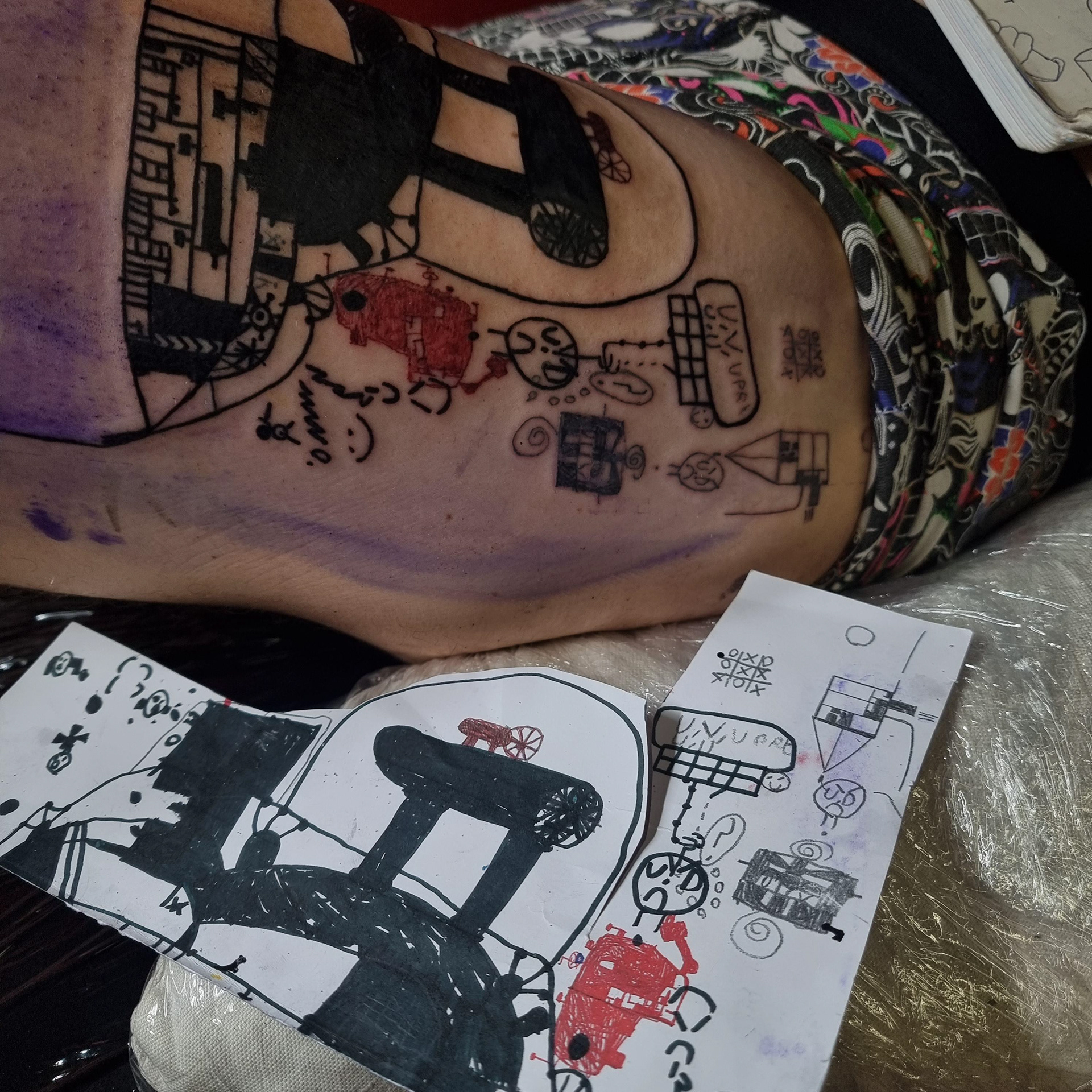 kid's drawing memorial tattoo