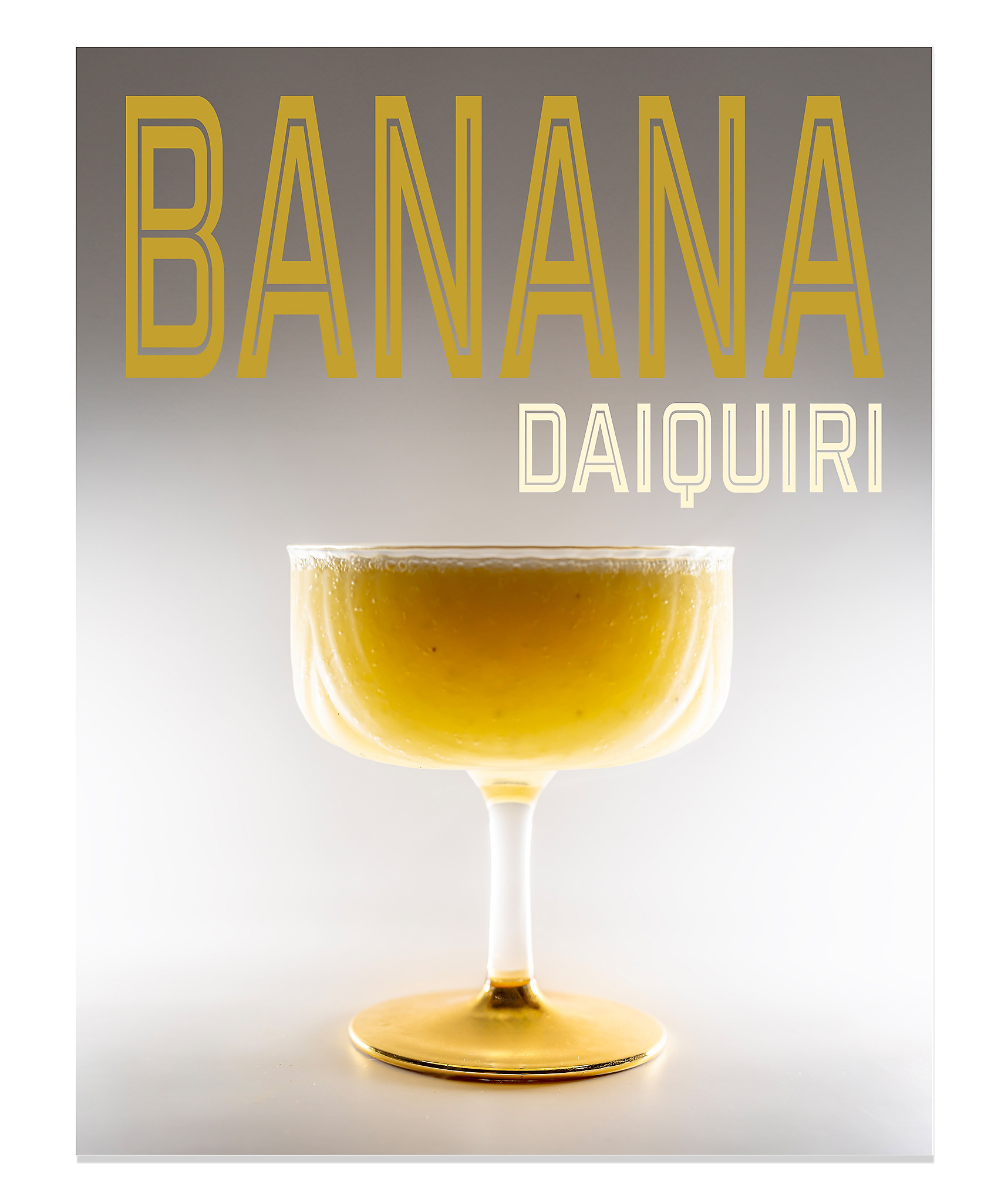 A vibrant magazine-style cover featuring a Banana Daiquiri on a gradient black, white, and gray background. The creamy tropical drink is served in a chilled coupe glass. The moody tones and sleek design emphasize the modern sophistication of this classic cocktail.