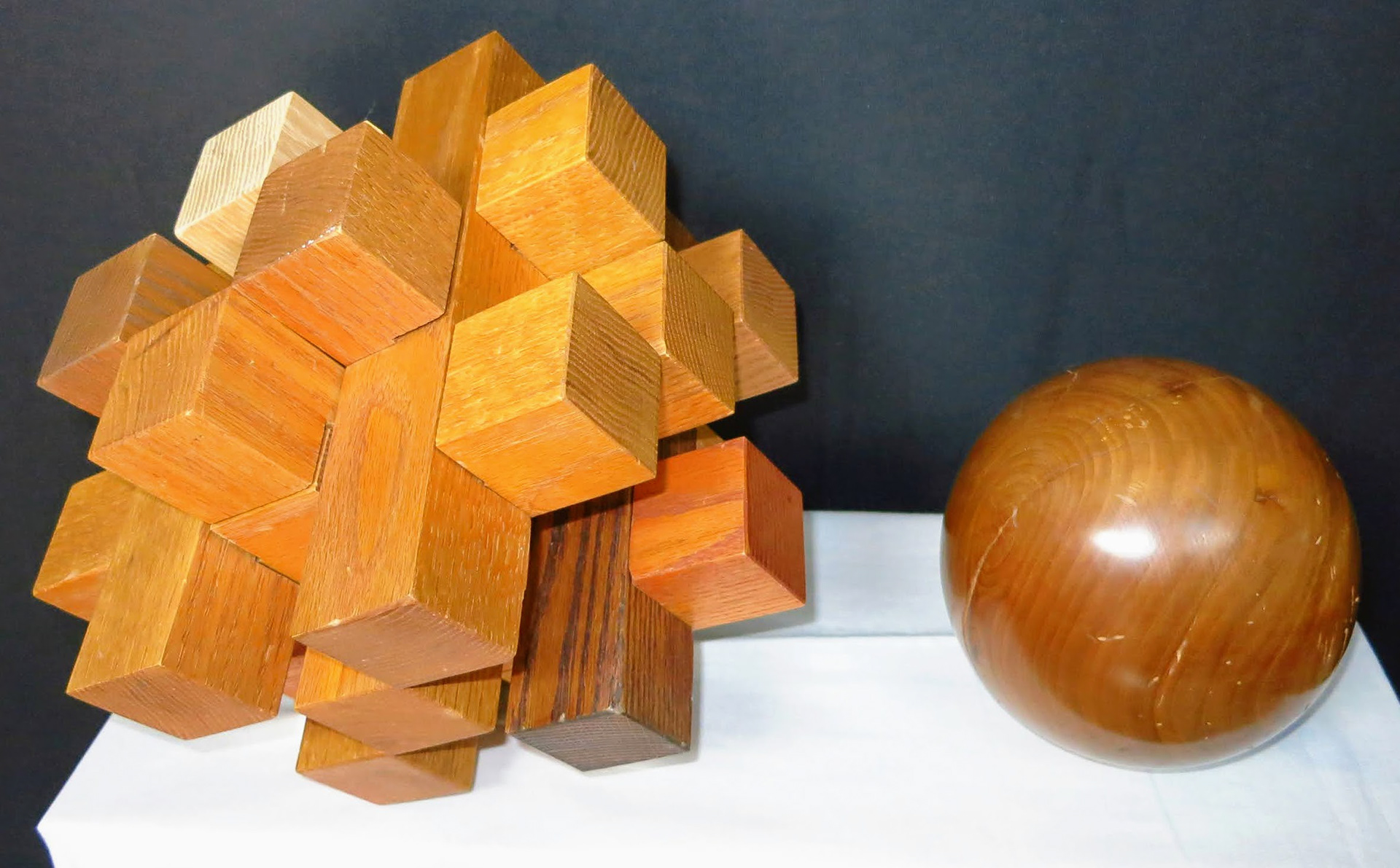 Wood Puzzle and Cherry Sphere